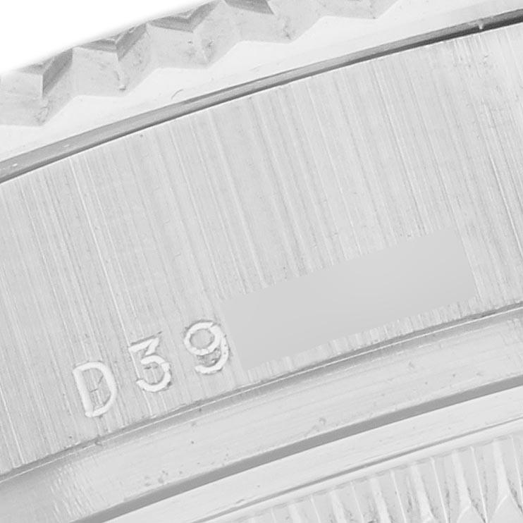 The close-up image shows the textured bezel and part of the serial number of a Rolex President 179179 Women's White Gold Mother of Pearl Dial 179179 Women's White Gold Mother of Pearl Dial watch.