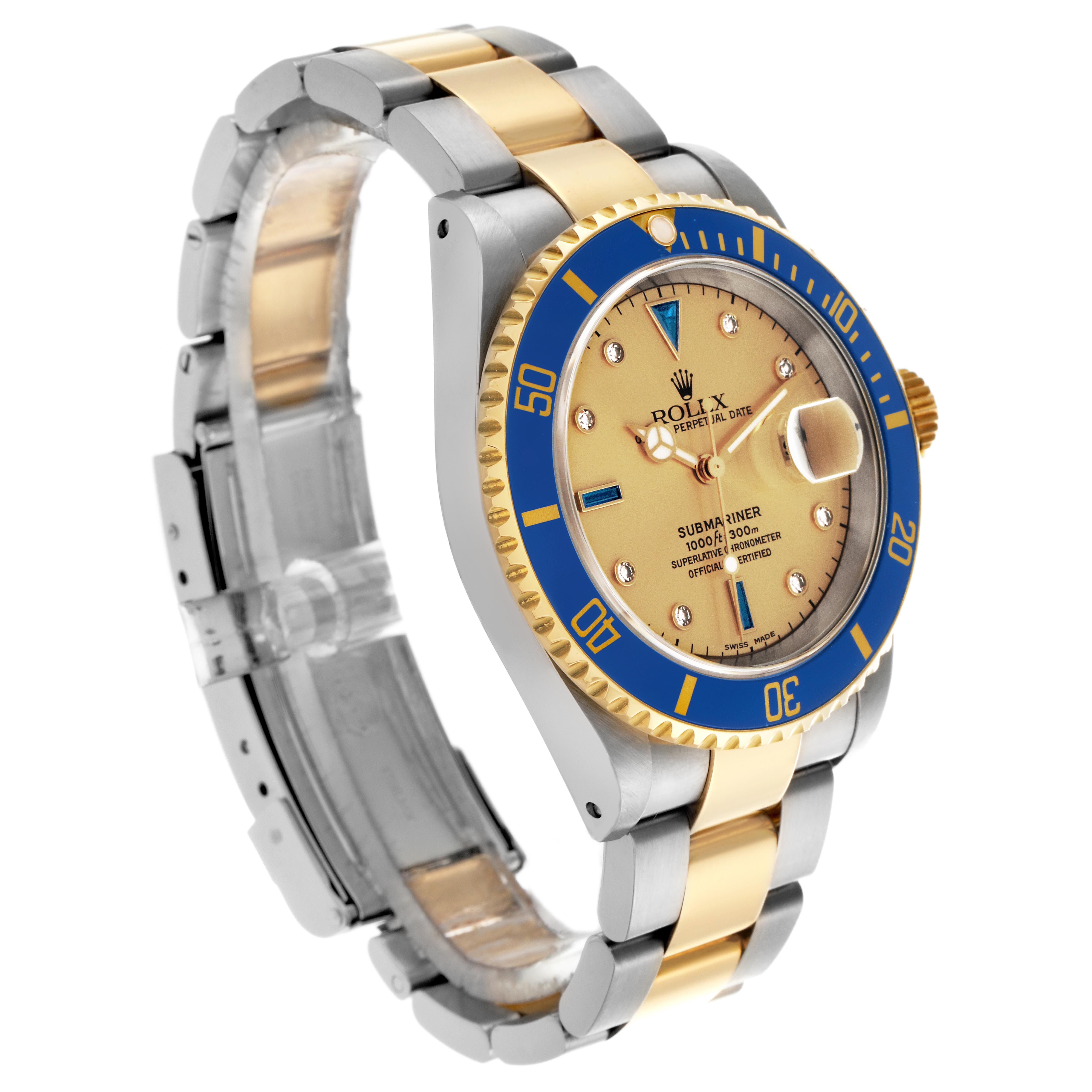 The Rolex Submariner 16613 Men
s Steel and Gold (two tone) Champagne Dial 16613 Men
s Steel and Gold (two tone) Champagne Dial is shown at a slight angle, displaying the bezel, dial, and bracelet.