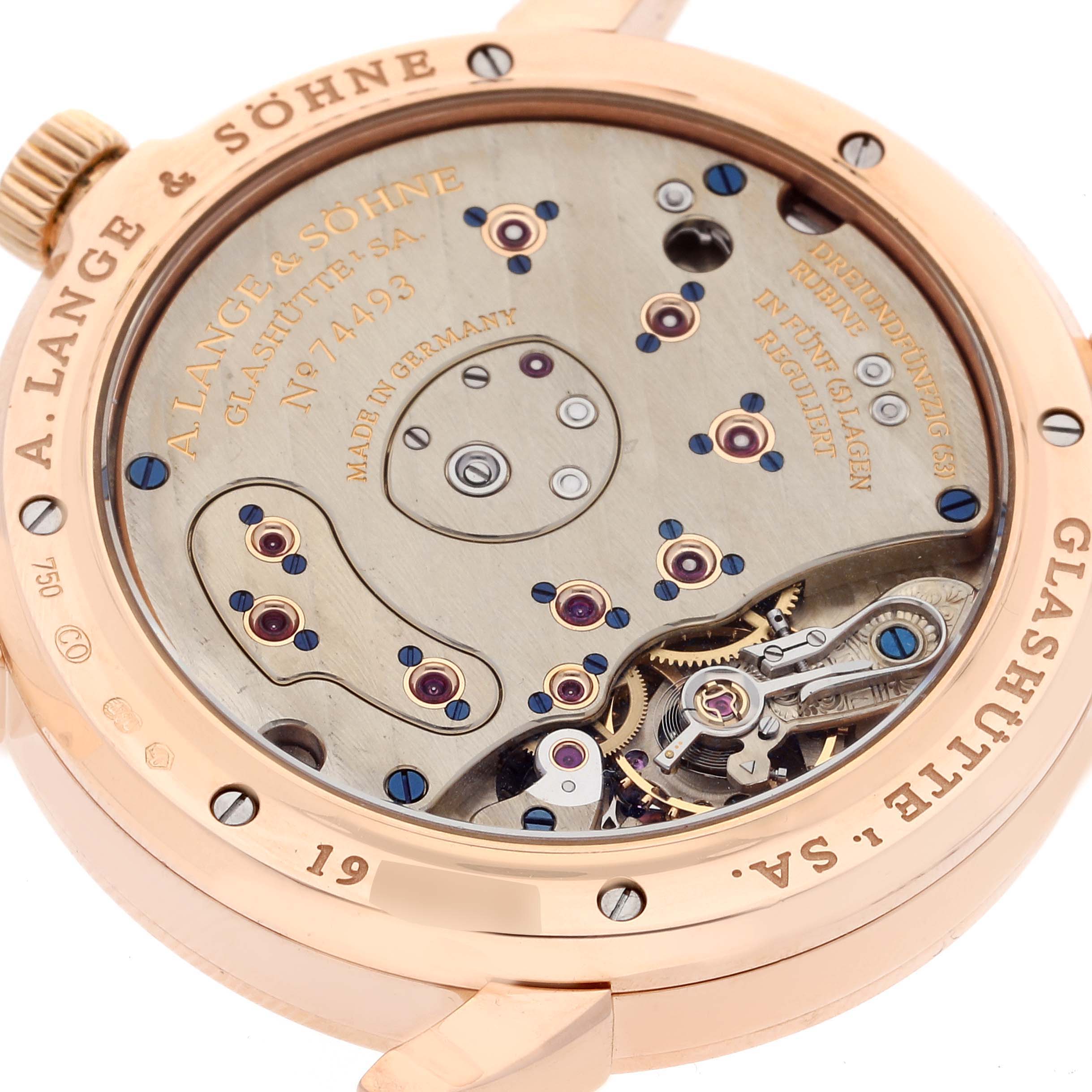 The image shows the case back of an A. Lange & Sohne Lange 1 101.032 Men's Rose Gold Silver Dial watch, highlighting its intricate movement.