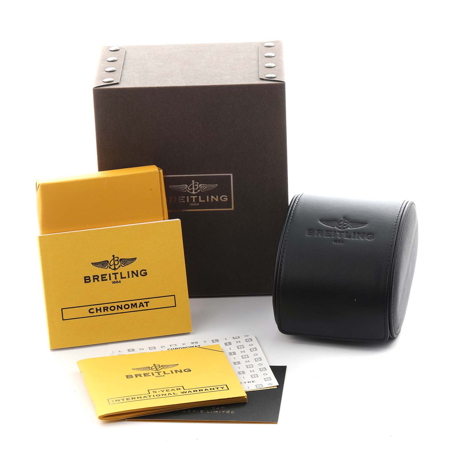 The image shows a Breitling Chronomat AB0110 Men
s Stainless Steel Mother of Pearl Dial AB0110 Men
s Stainless Steel Mother of Pearl Dial watch box set, including the packaging, a black case, and documentation.