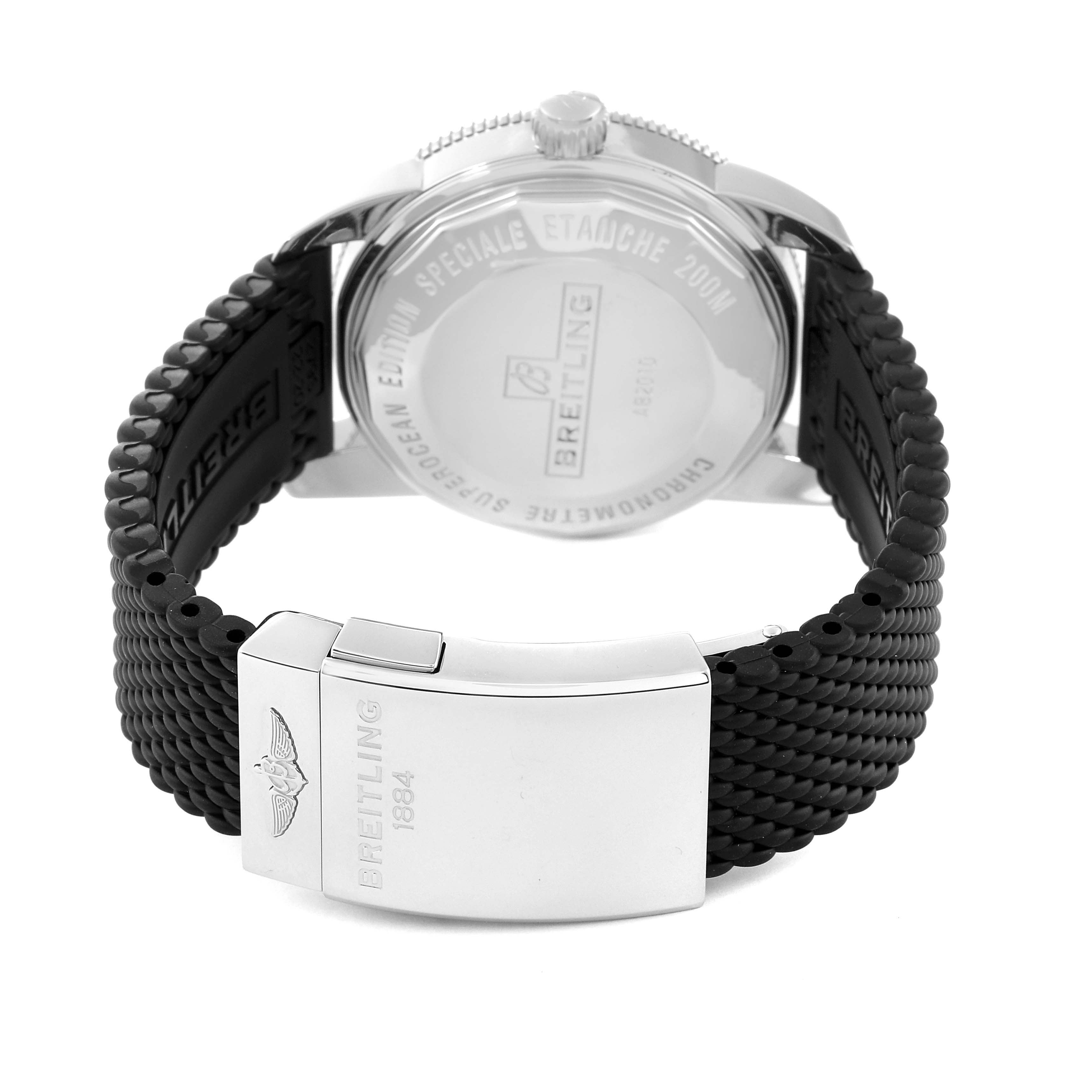 The image shows the back and clasp of a Breitling Superocean AB2010 Men's Stainless Steel Green Dial AB2010 Men's Stainless Steel Green Dial watch, highlighting the back case and black rubber strap.