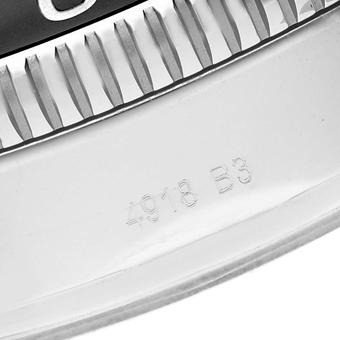 The image shows a close-up of the bezel and serial number on a Breitling Superocean A13320 Men
s Stainless Steel Black Dial A13320 Men
s Stainless Steel Black Dial watch.