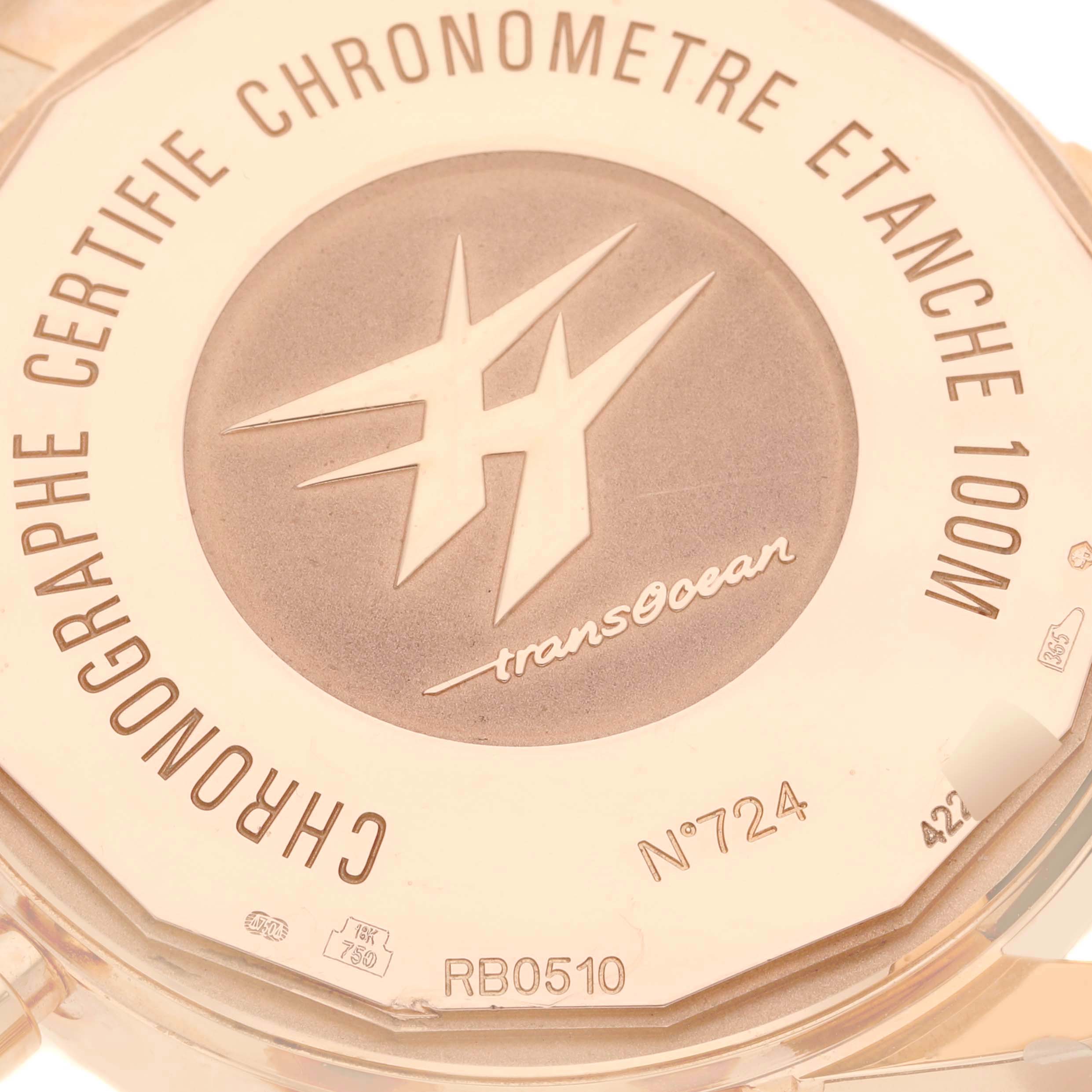 The image shows the case back of a Breitling Transocean RB0510U4-BB63BKLD Men's Rose Gold Black Dial RB0510U4-BB63BKLD Men's Rose Gold Black Dial watch, highlighting its engravings and water resistance details.