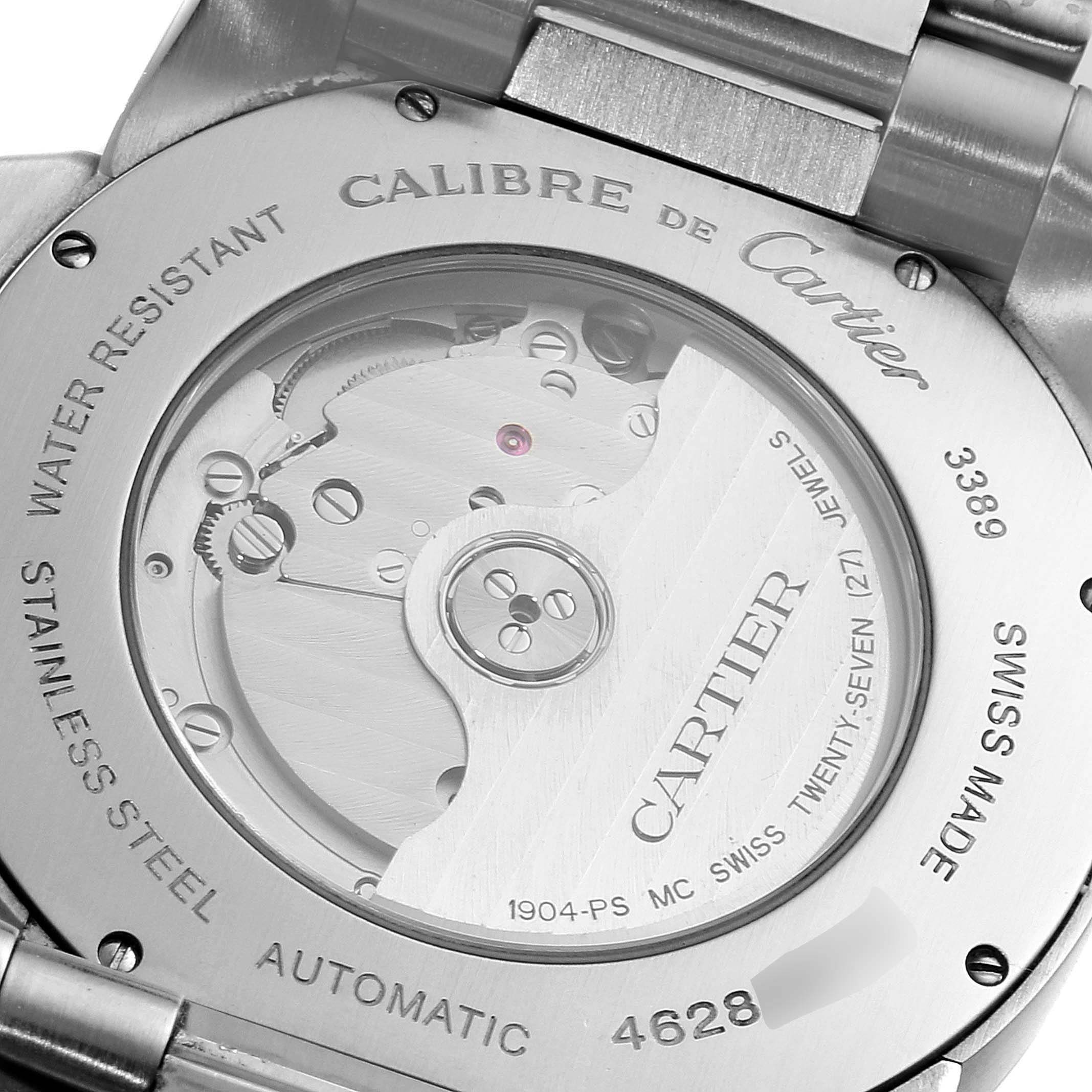This image shows the back view of the Calibre de Cartier model by Cartier, revealing its automatic movement and engravings.