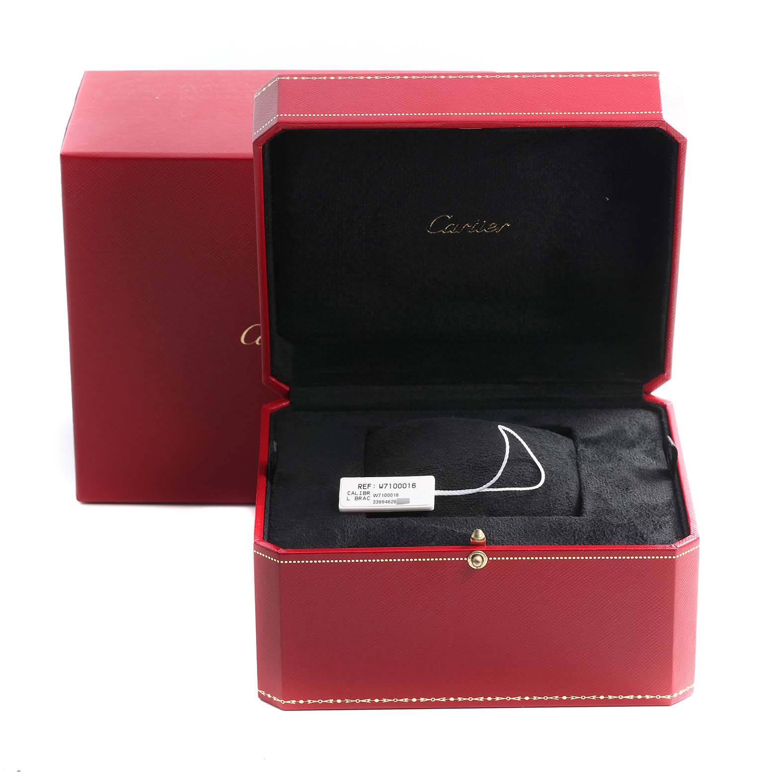 The image shows the packaging of a Calibre de Cartier watch by Cartier, including a red box with the watch displayed inside.