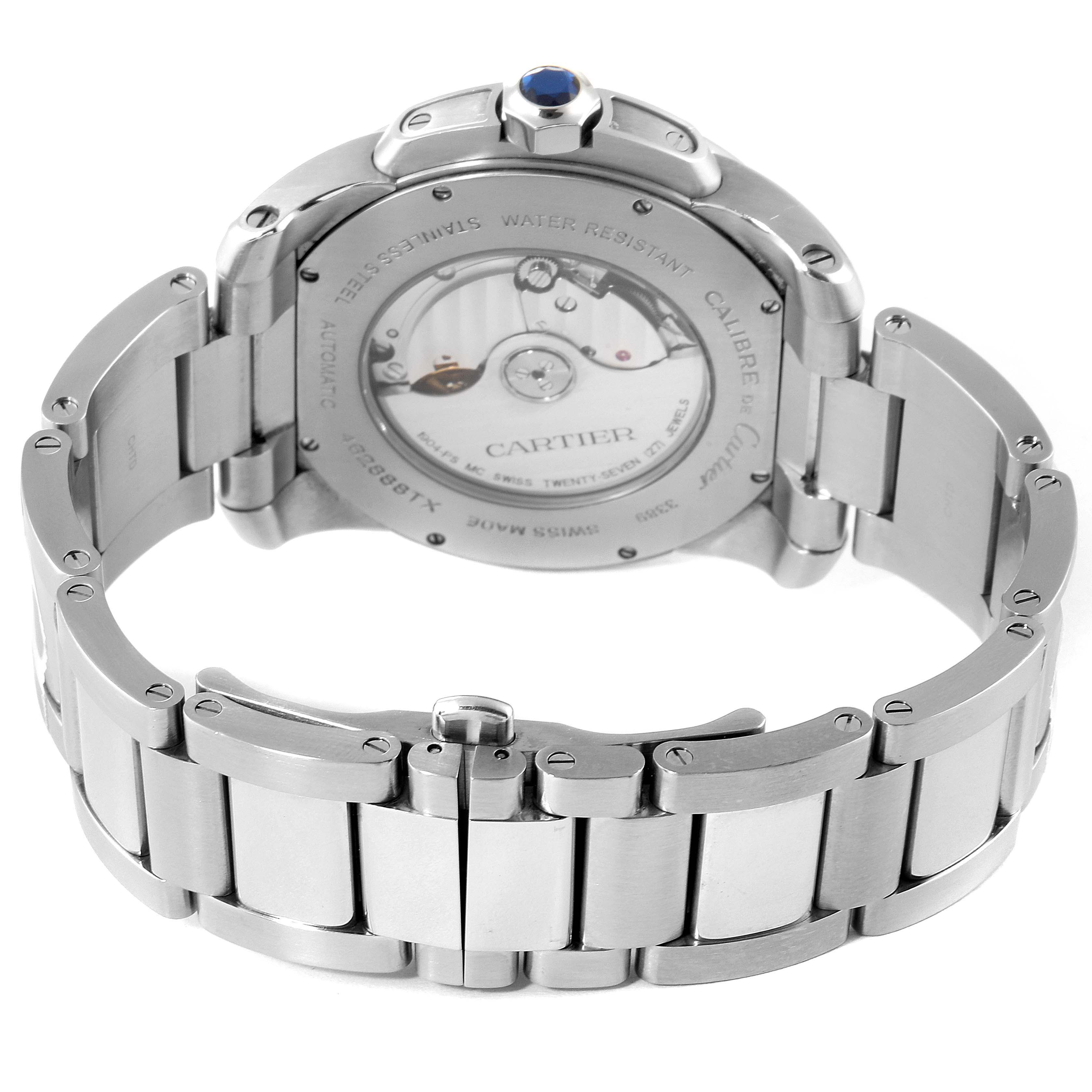 The image shows the back and bracelet of the Calibre de Cartier model by Cartier at an angle revealing the automatic movement.
