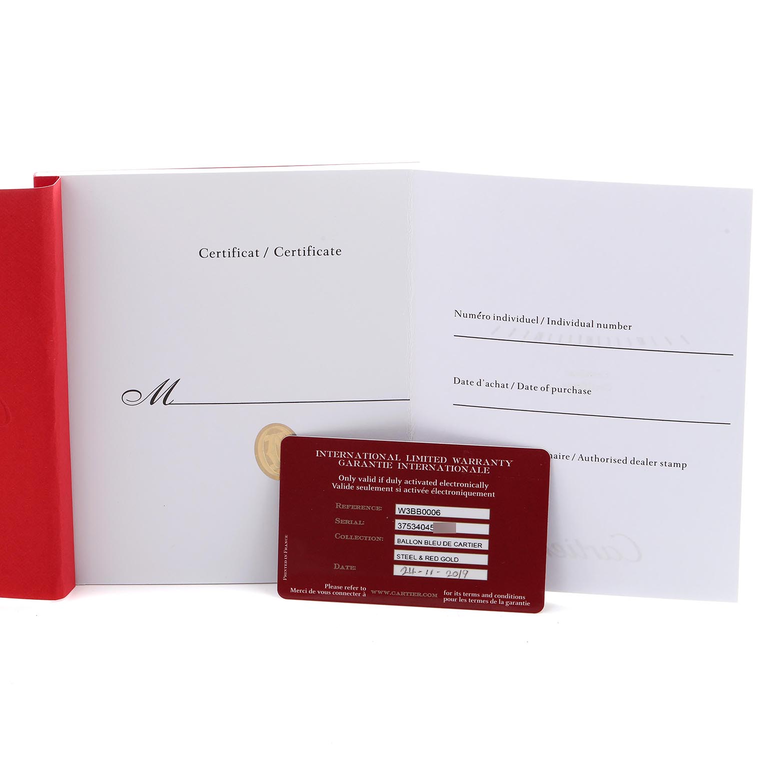 The image shows the warranty card and certificate for the Cartier Ballon Bleu W3BB0006 Women
s Steel and Gold (two tone) Silver Dial W3BB0006 Women
s Steel and Gold (two tone) Silver Dial watch, displayed at a slight angle.