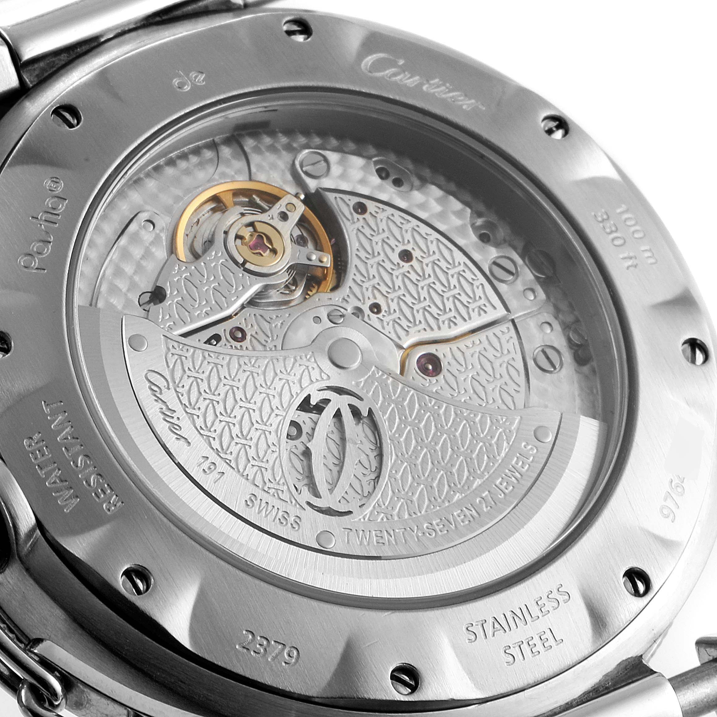 The image shows a close-up of the back case of a Cartier Pasha W31040H3 Men
s Stainless Steel Silver Dial W31040H3 Men
s Stainless Steel Silver Dial watch, displaying its intricate mechanical movement.