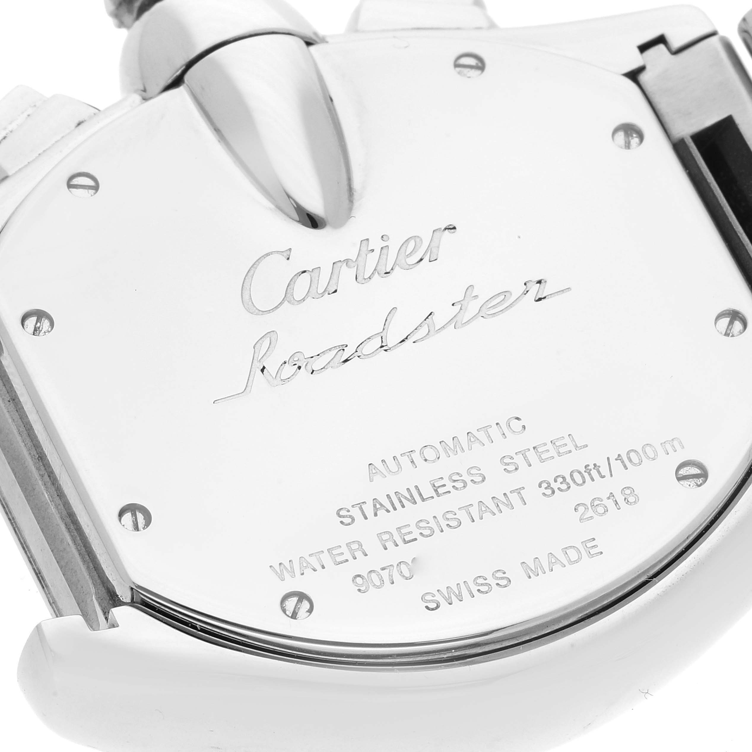 The image shows the back case of a Cartier Roadster W62020X6 Men's Stainless Steel Black Dial W62020X6 Men's Stainless Steel Black Dial watch, highlighting its inscriptions and stainless steel material.