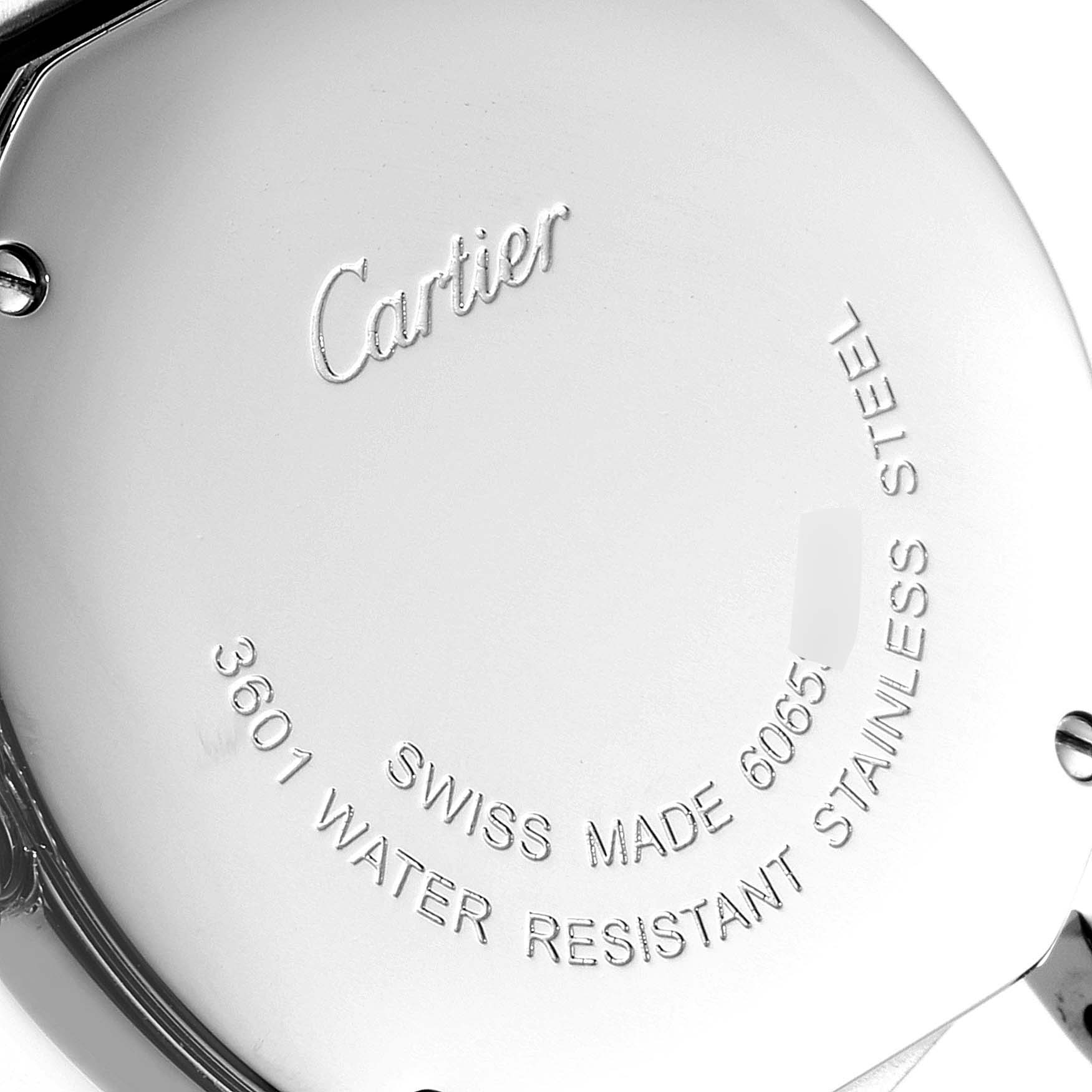 The image shows the engraved case back of a Cartier Ronde W6701004 Women's Stainless Steel Silver Dial W6701004 Women's Stainless Steel Silver Dial watch, emphasizing its stainless steel construction and water resistance.