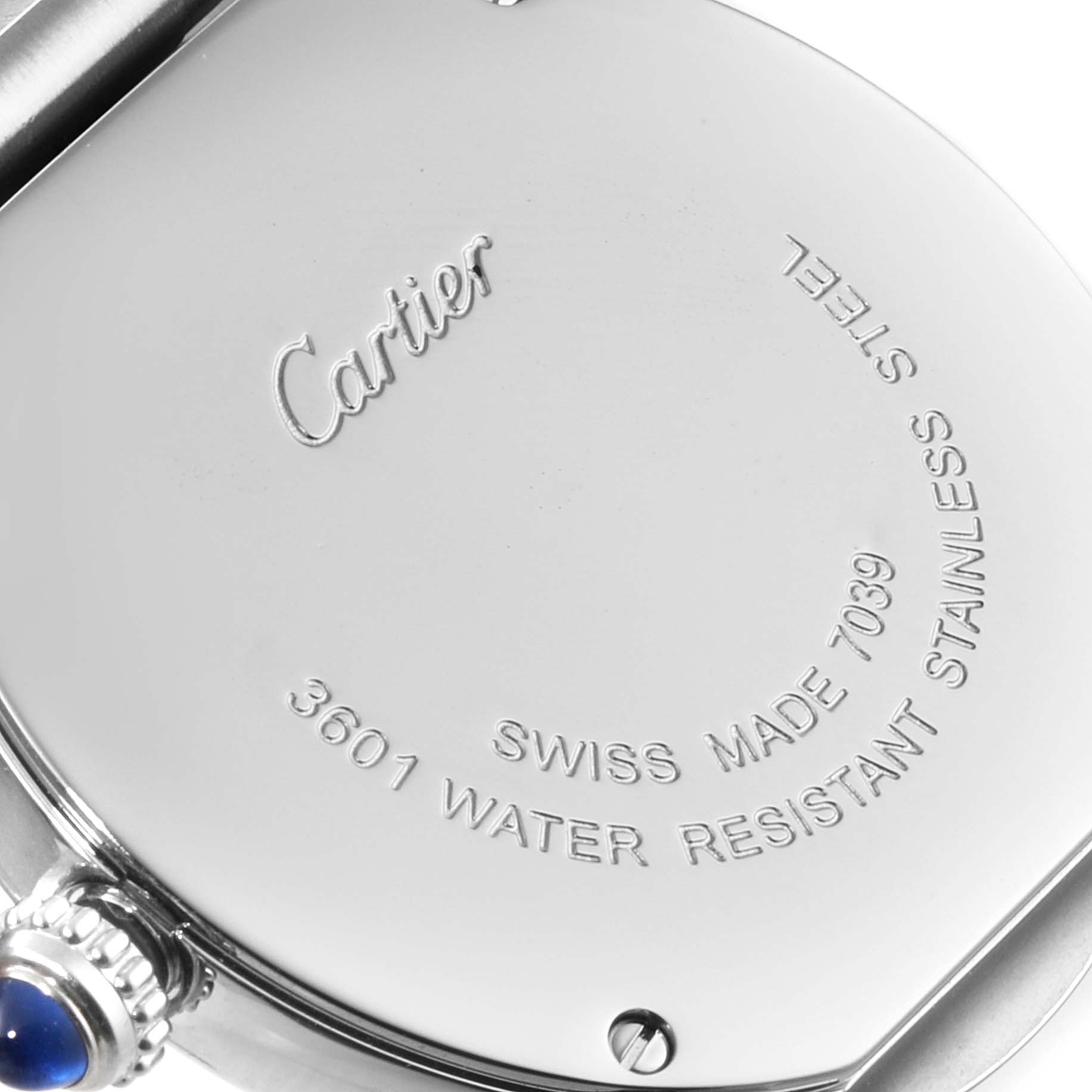 This image shows the back of a Cartier Ronde W6701004 Women's Stainless Steel Silver Dial W6701004 Women's Stainless Steel Silver Dial model watch, highlighting the inscriptions and part of the crown.