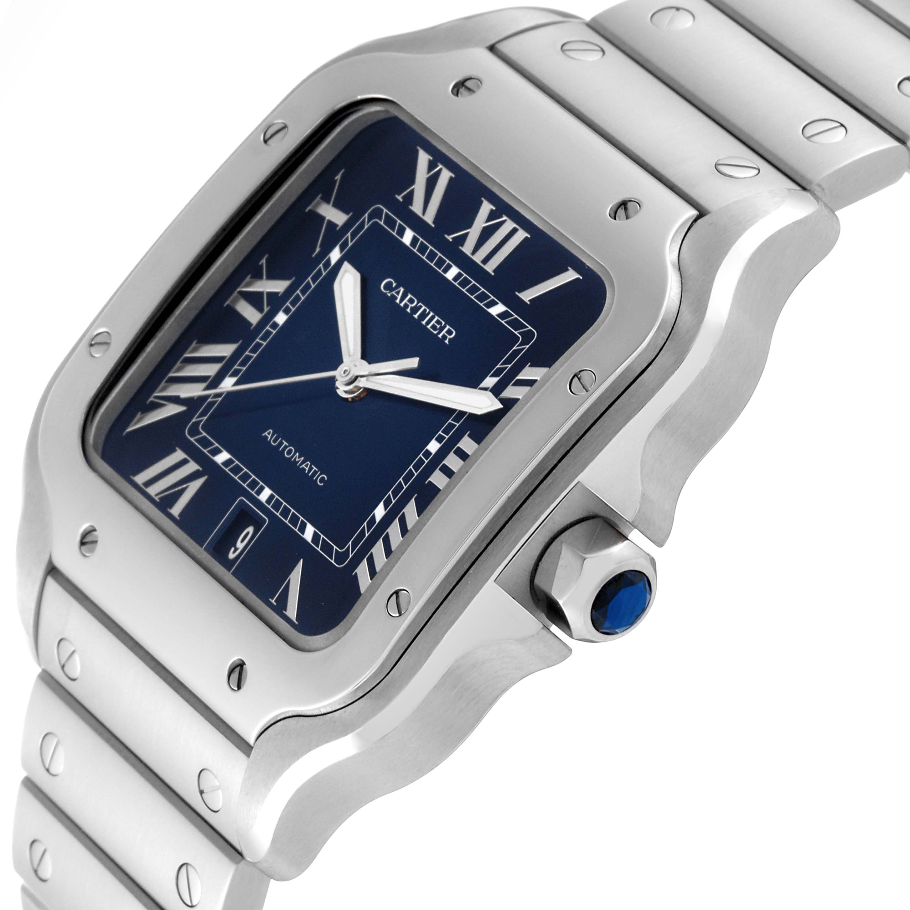 The image shows a close-up angle of the Cartier Santos WSSA0030 Men's Stainless Steel Blue Dial WSSA0030 Men's Stainless Steel Blue Dial model watch, highlighting its face, bezel, crown, and part of the bracelet.