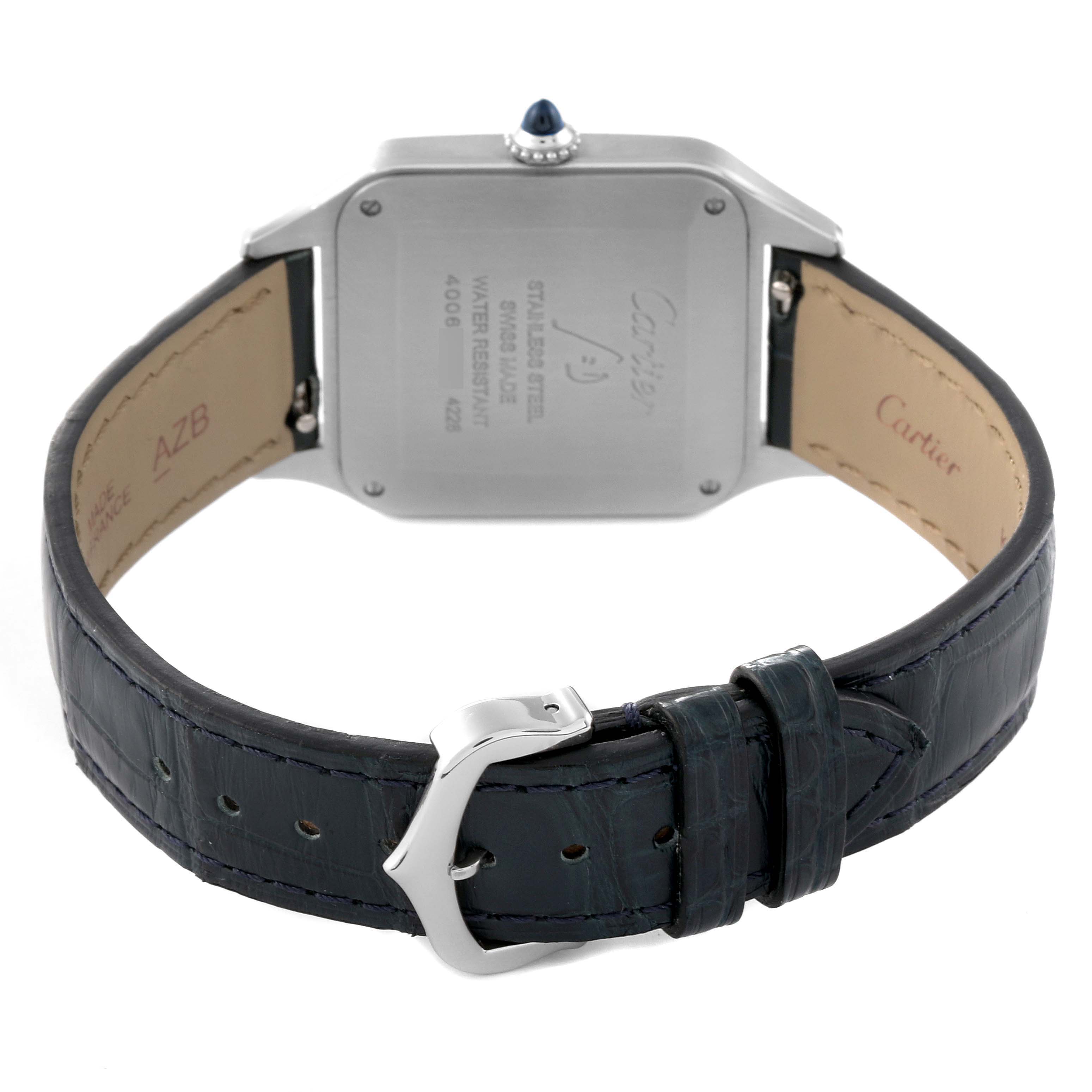 The image shows the backside of a Cartier Santos Dumont WSSA0022 Men's Stainless Steel Silver Dial WSSA0022 Men's Stainless Steel Silver Dial watch, including the case back, crown, and leather strap with buckle.