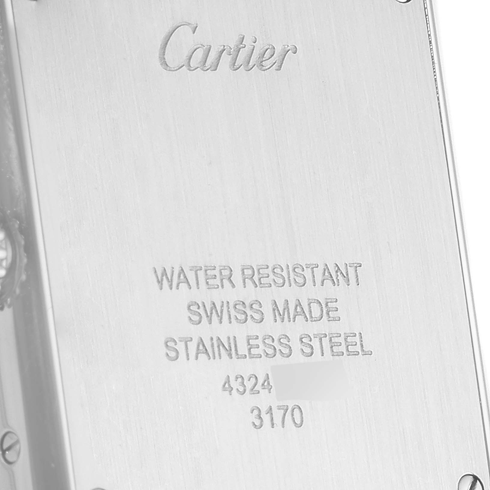 This is a close-up of the back case of a Cartier Tank Solo W5200013 Women's Stainless Steel Silver Dial W5200013 Women's Stainless Steel Silver Dial watch, showing the engraved brand name and specifications.