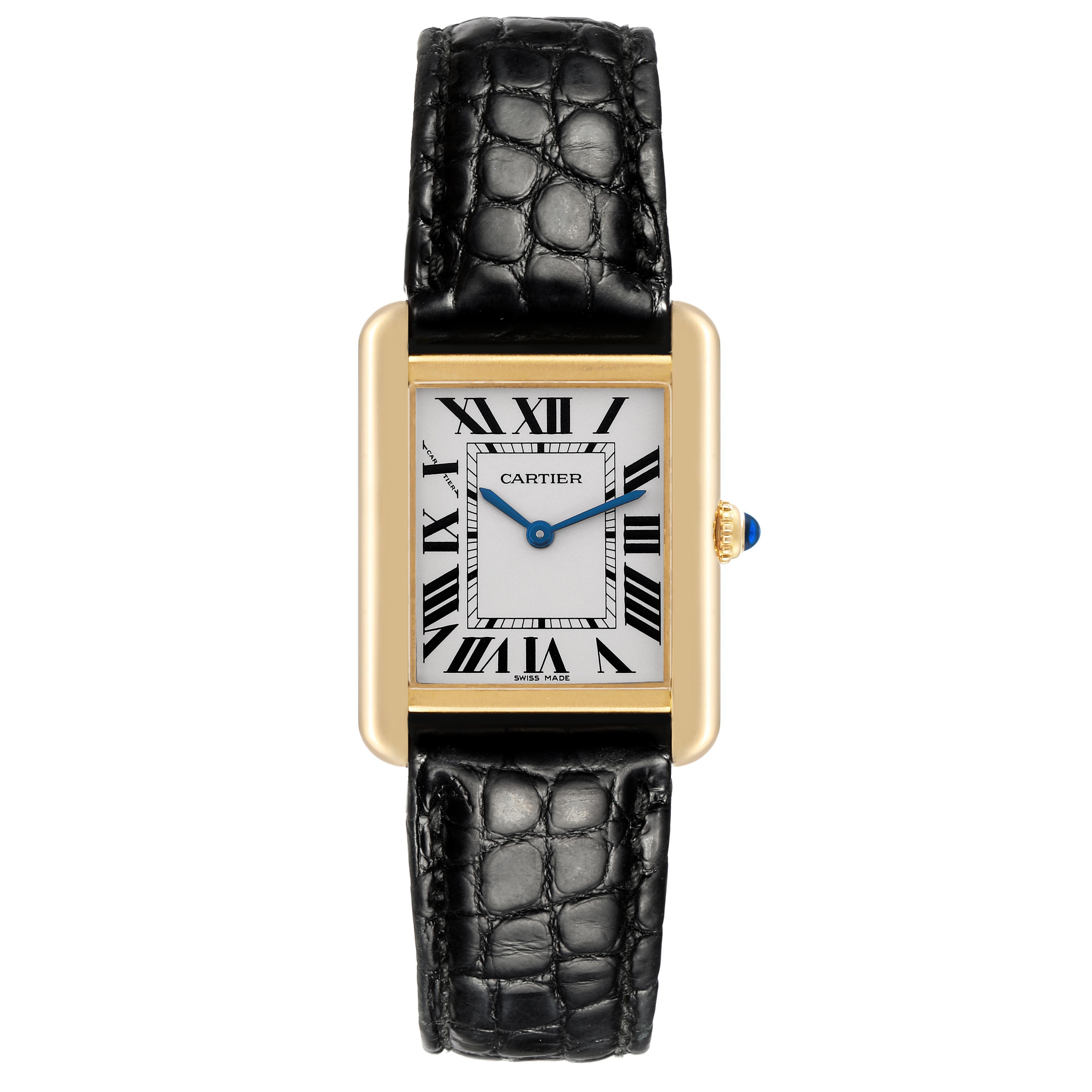 The Cartier Tank Solo W5200002 Women
s Steel and Gold (two tone) Silver Dial W5200002 Women
s Steel and Gold (two tone) Silver Dial watch is shown from the front, displaying its rectangular face, Roman numerals, blue hands, and black leather strap.