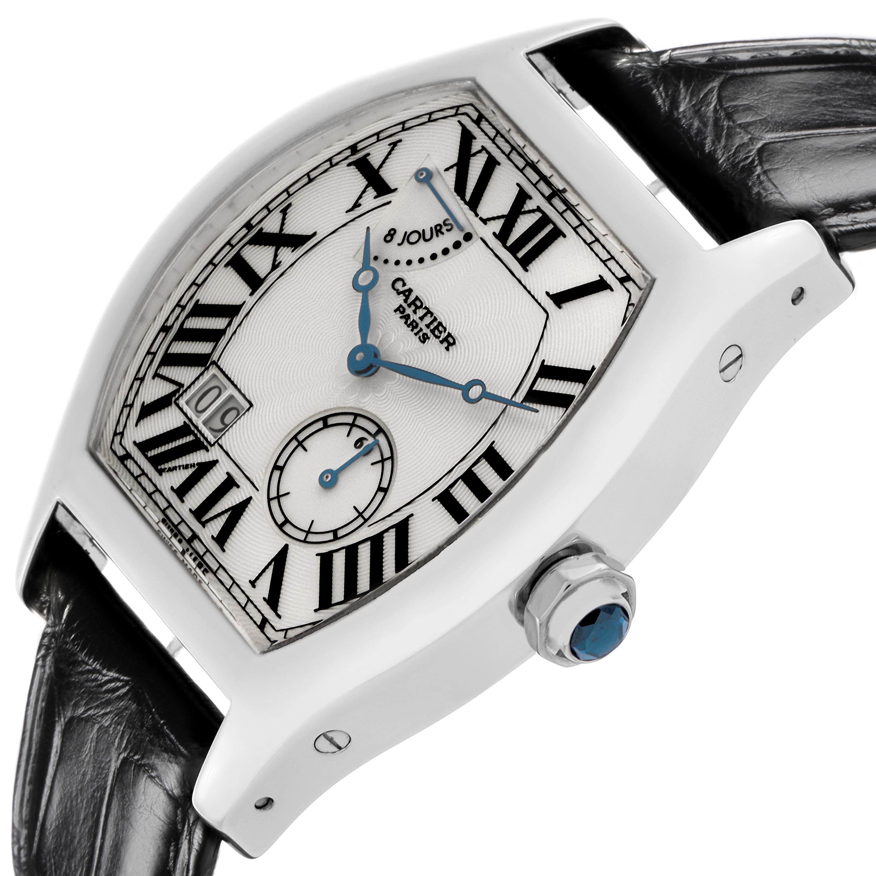 The Cartier Tortue W1545951 Men
s White Gold Silver Dial W1545951 Men
s White Gold Silver Dial watch is shown at an angle highlighting the face, crown, and part of the leather strap.