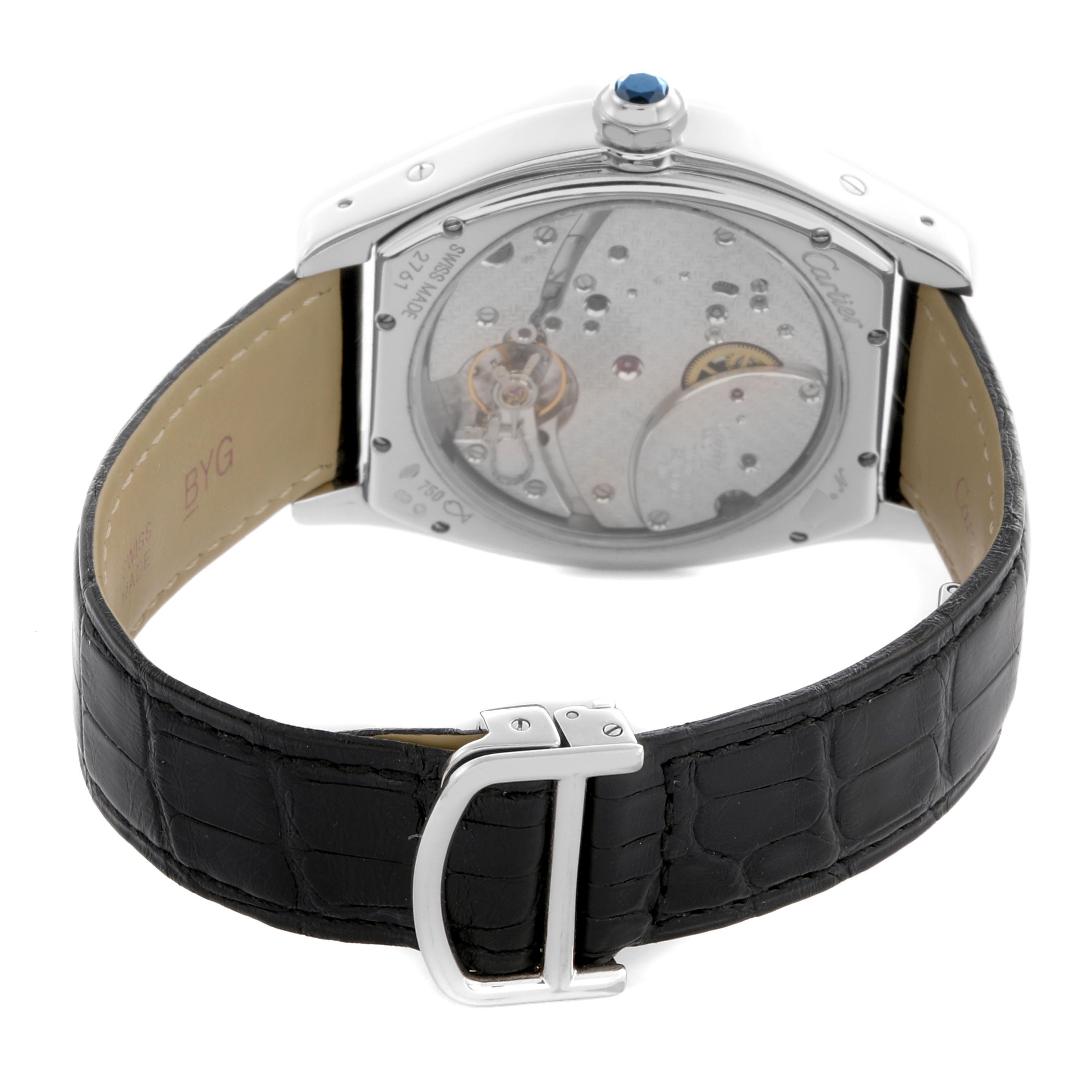 The Cartier Tortue W1545951 Men
s White Gold Silver Dial W1545951 Men
s White Gold Silver Dial watch is shown from the back, highlighting its mechanism, sapphire cabochon crown, and black leather strap.