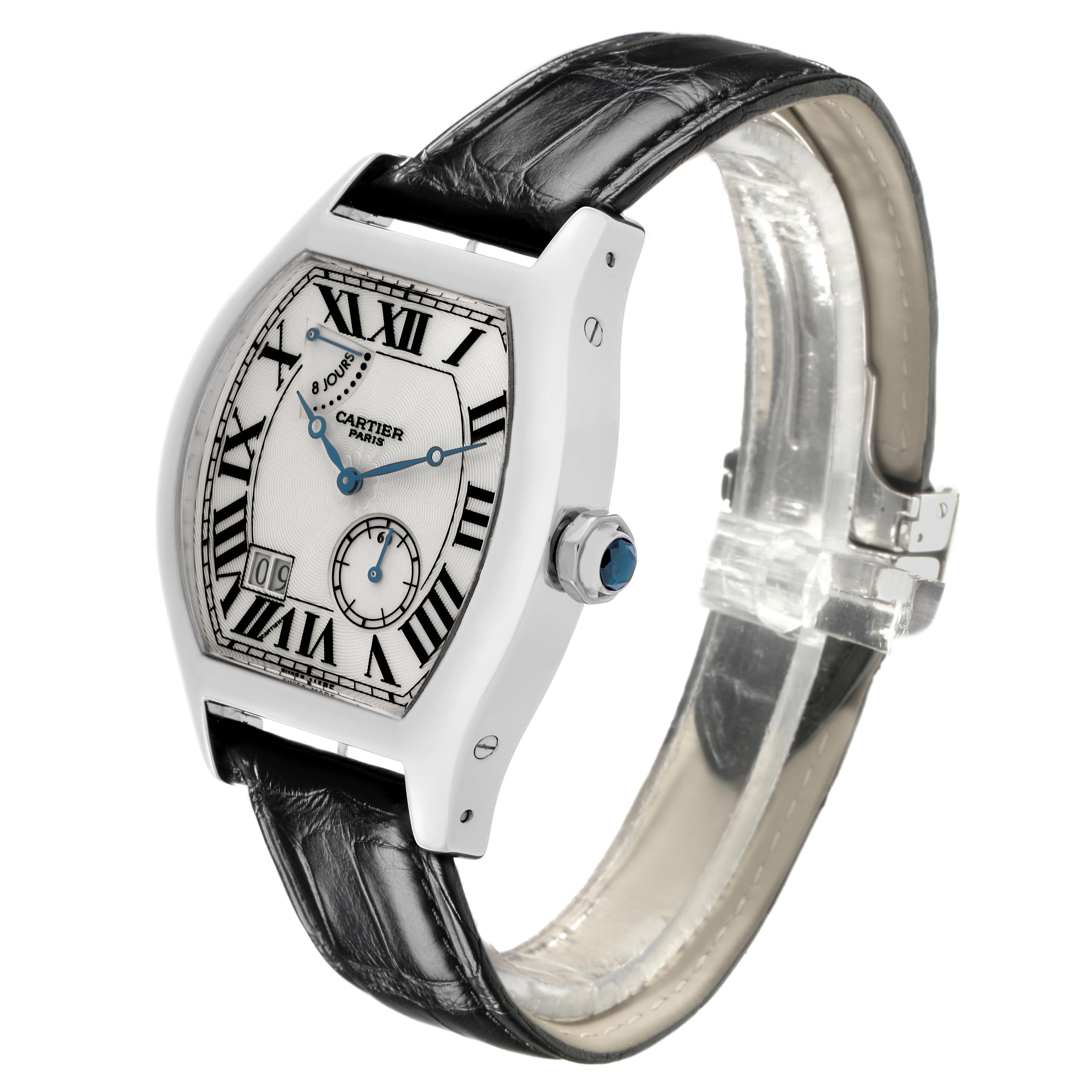 The Cartier Tortue W1545951 Men
s White Gold Silver Dial W1545951 Men
s White Gold Silver Dial watch is shown from a front-left angle, highlighting its case, dial, and strap.