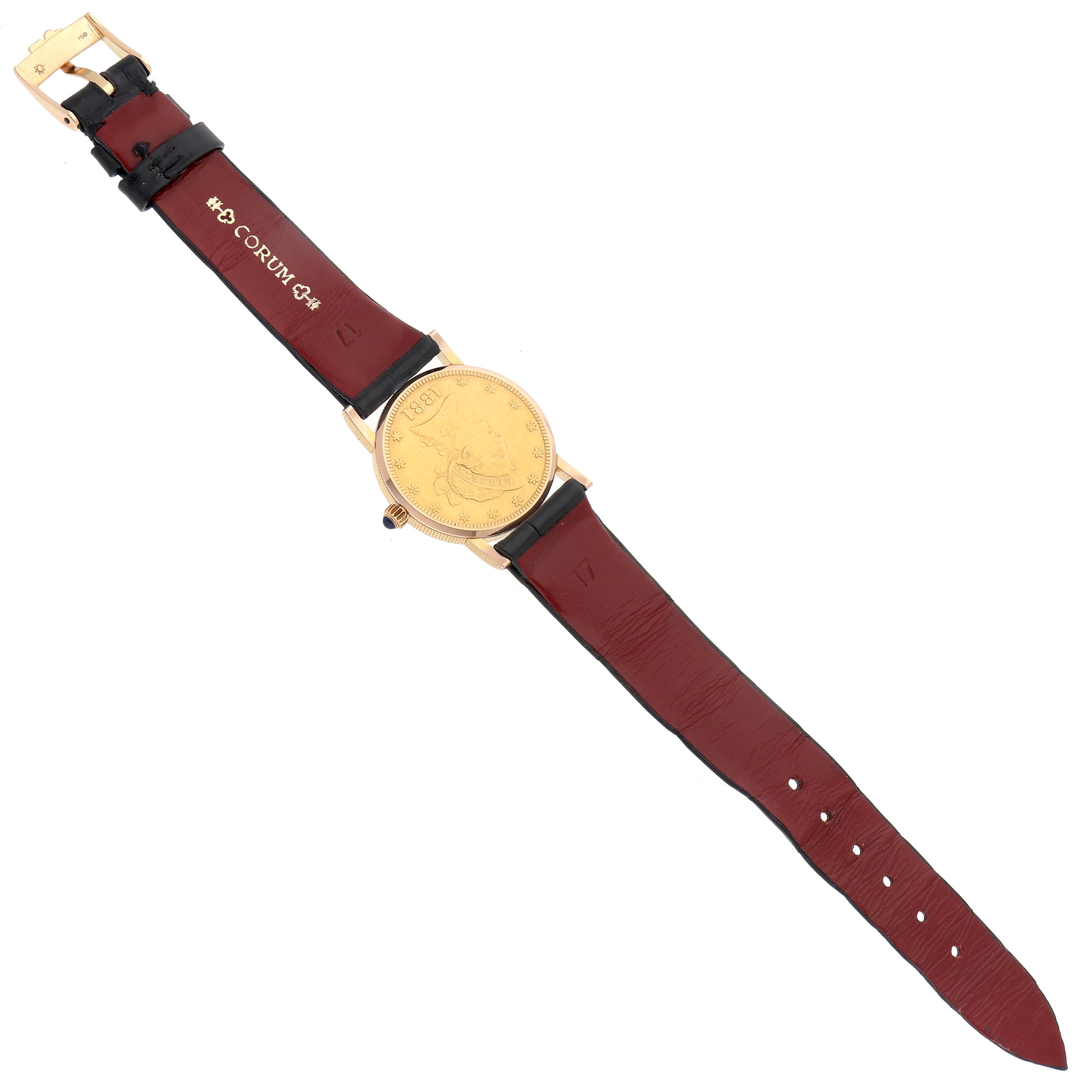 The Corum Coin Watch Men
s Yellow Gold Champagne Dial Men
s Yellow Gold Champagne Dial model is shown from a top angle, displaying the full face and leather strap with a visible buckle.