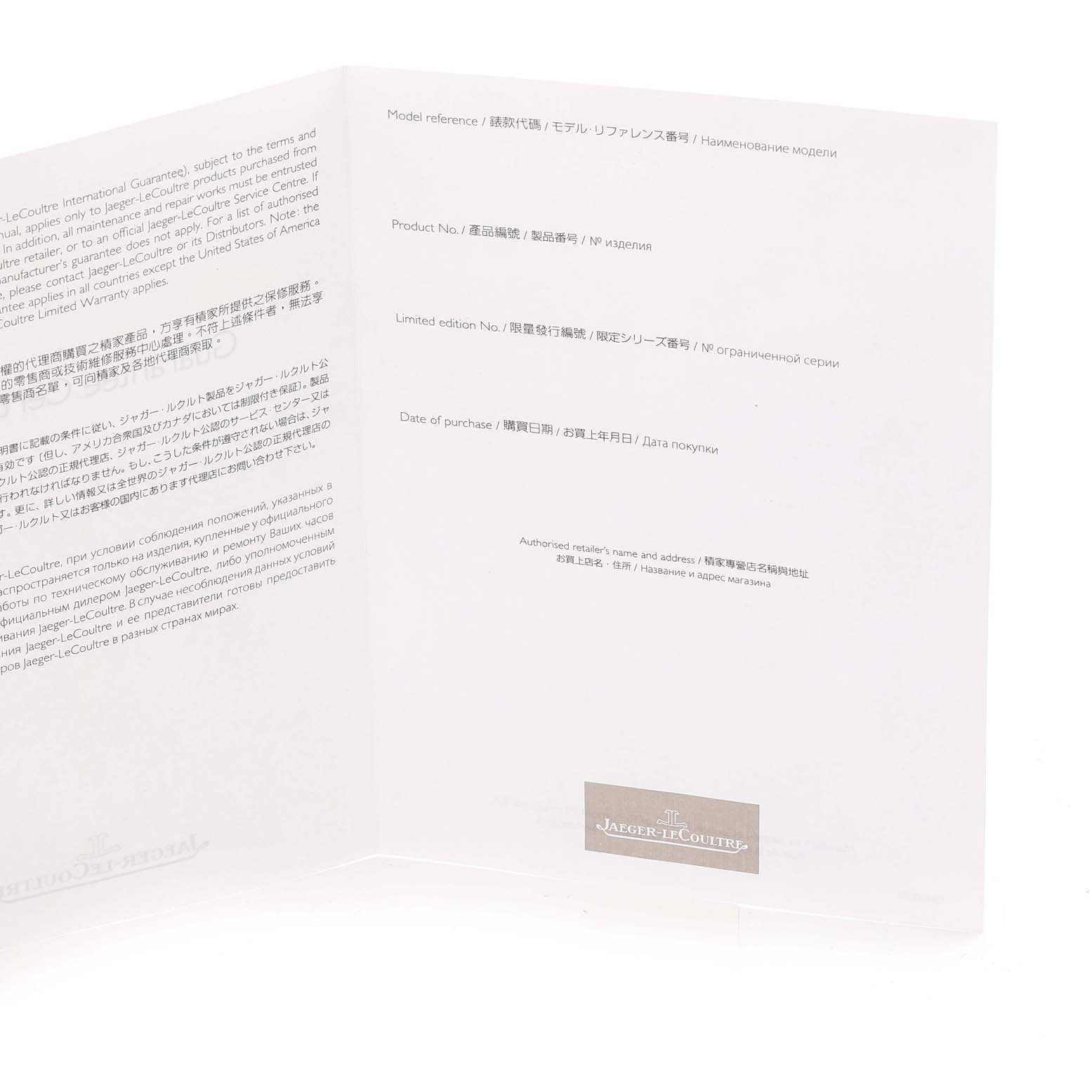 This image shows an open Jaeger-LeCoultre Reverso model warranty and registration card from an angled top-down perspective.