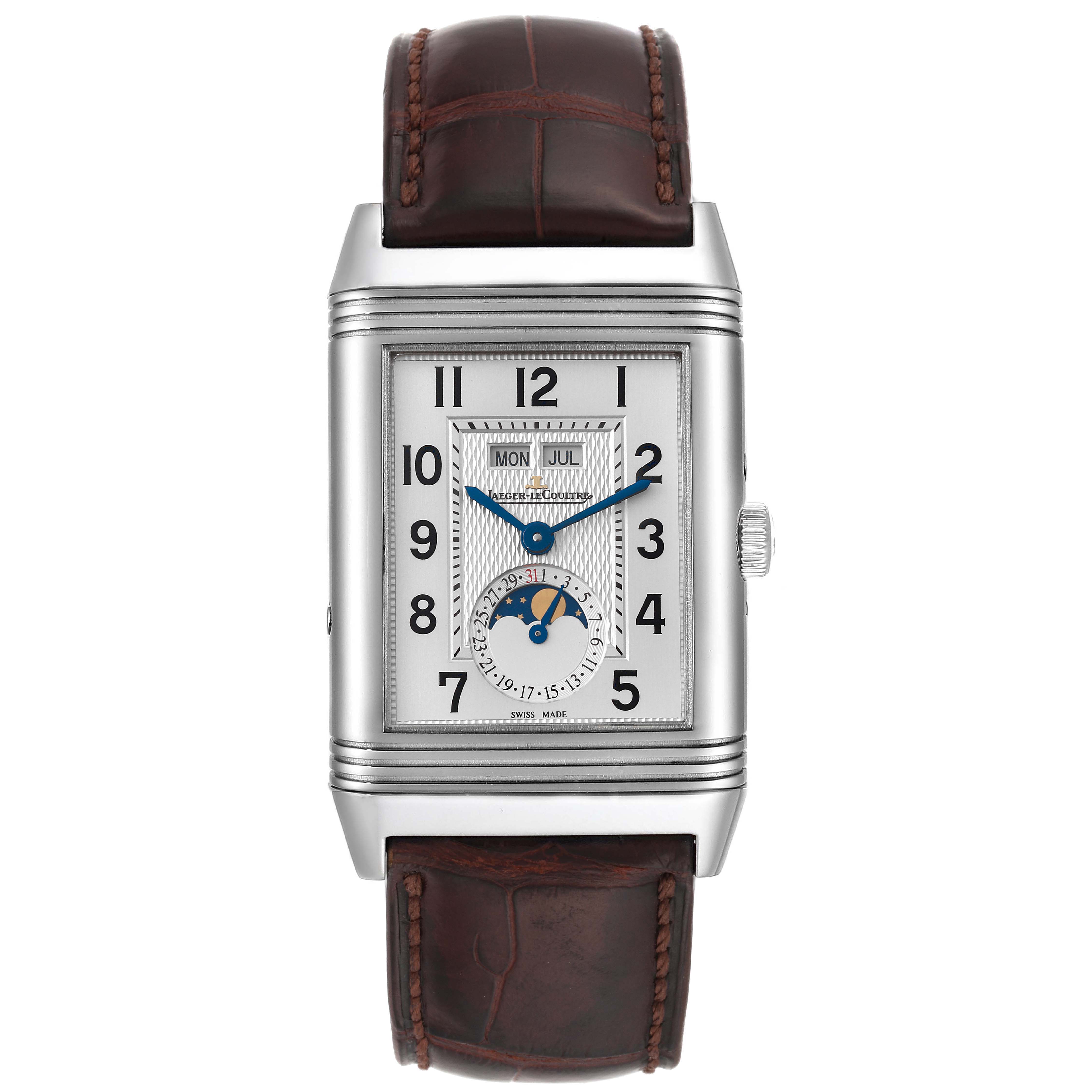 The Jaeger-LeCoultre Reverso watch is shown from the front, highlighting its rectangular face, hands, dial, and leather strap.