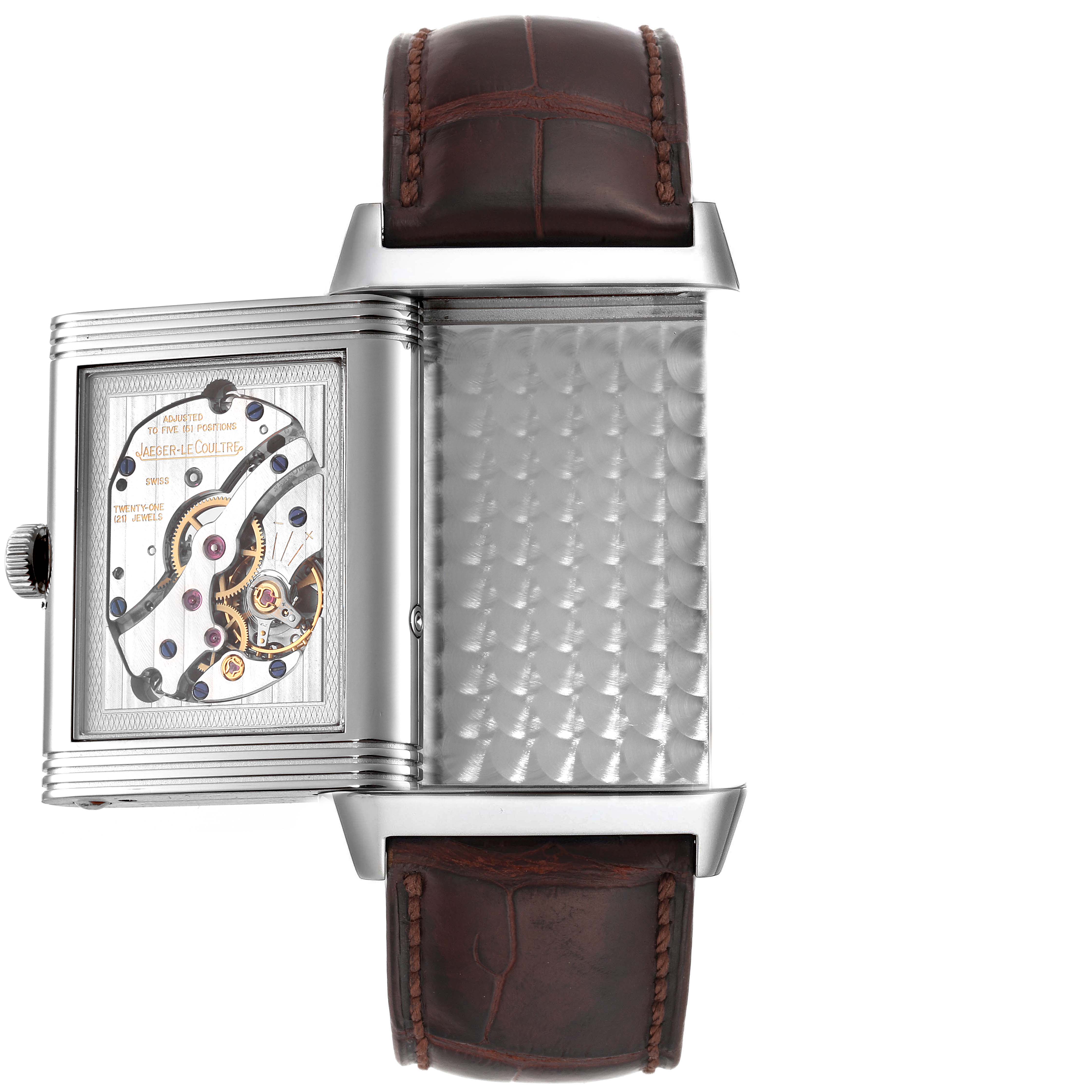 The image shows the Jaeger LeCoultre Reverso Q3758420 Men
s Stainless Steel Silver Dial Q3758420 Men
s Stainless Steel Silver Dial watch, displaying the movement mechanism and brown leather strap, viewed from above.