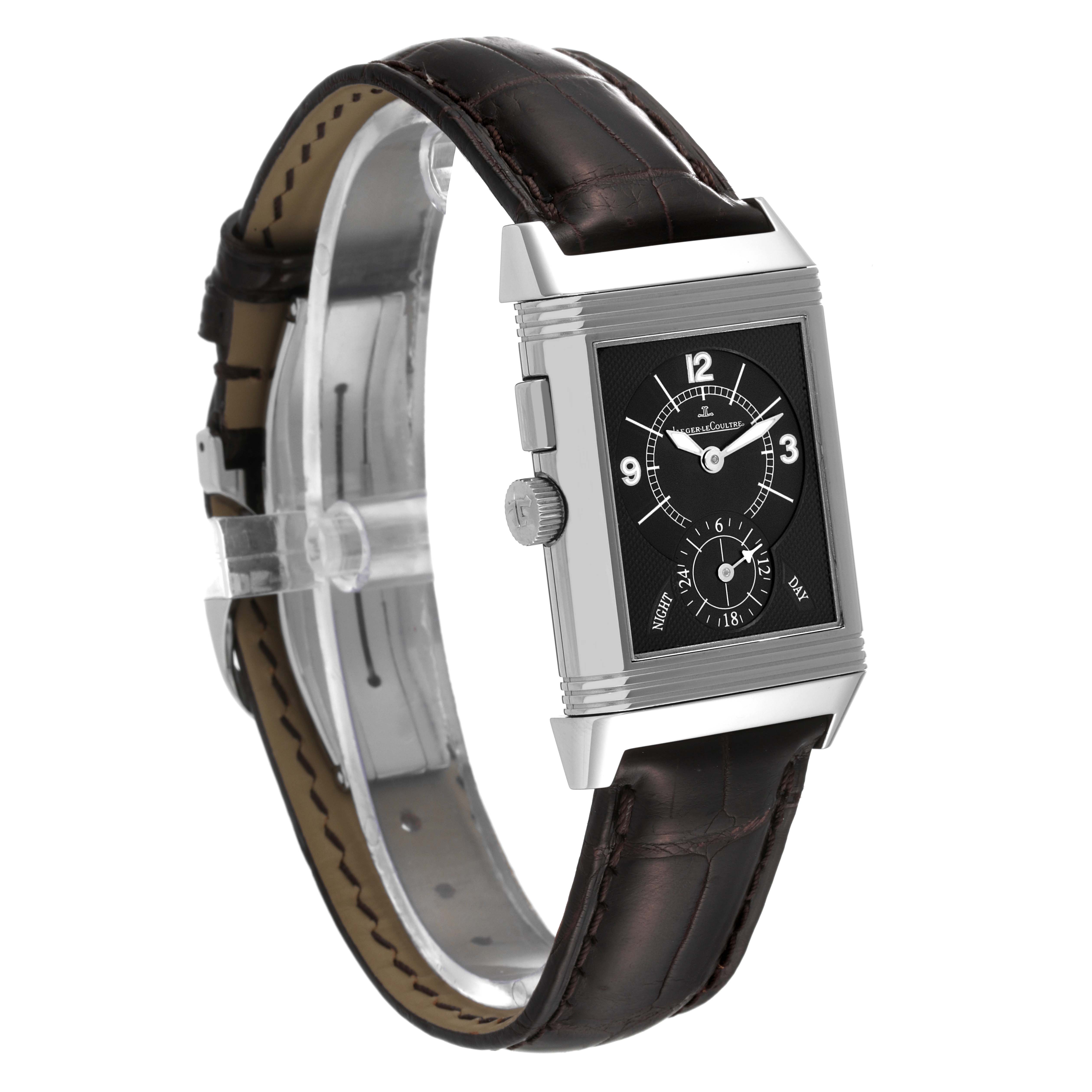 The Jaeger LeCoultre Reverso Q2718410 Men's Stainless Steel Silver Dial Q2718410 Men's Stainless Steel Silver Dial watch is shown at a three-quarter angle, highlighting its rectangular face, dial, crown, and leather strap.