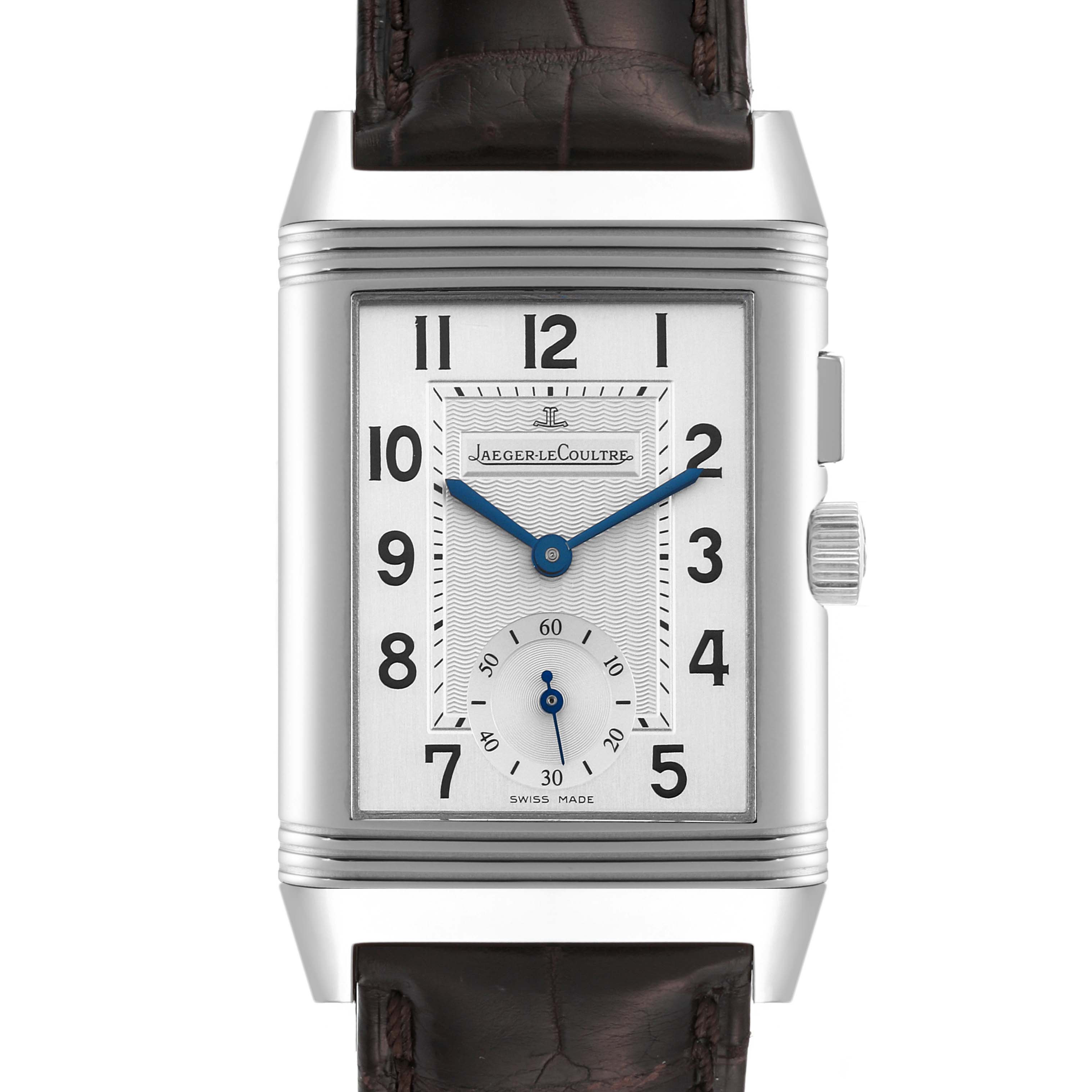 This image shows a frontal view of a Jaeger LeCoultre Reverso Q2718410 Men's Stainless Steel Silver Dial Q2718410 Men's Stainless Steel Silver Dial watch, highlighting its dial, hands, crown, and leather strap.