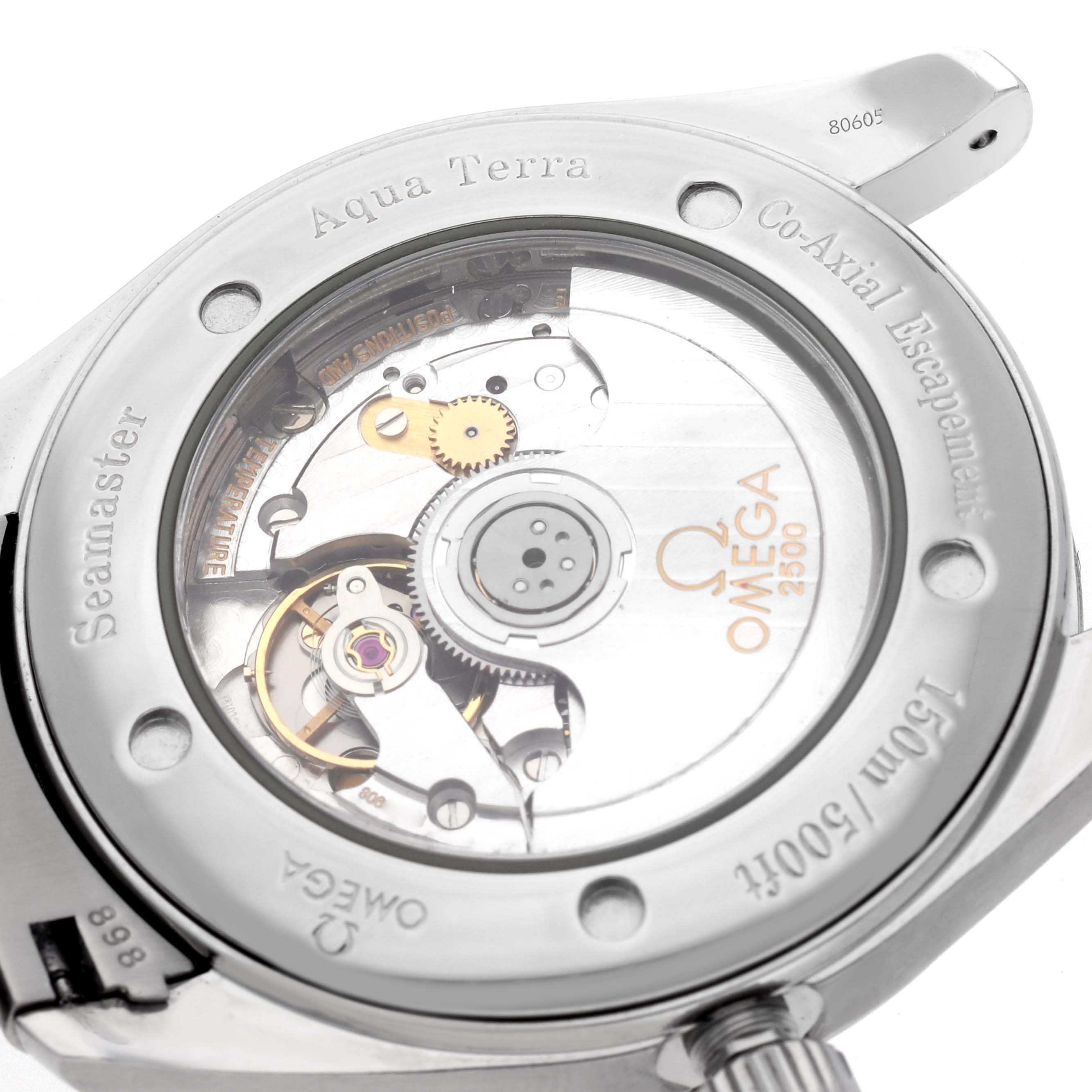 The image shows the back view of an Omega Seamaster 70839 Men
s Stainless Steel White Dial 70839 Men
s Stainless Steel White Dial watch, highlighting its visible mechanical movement and engravings.