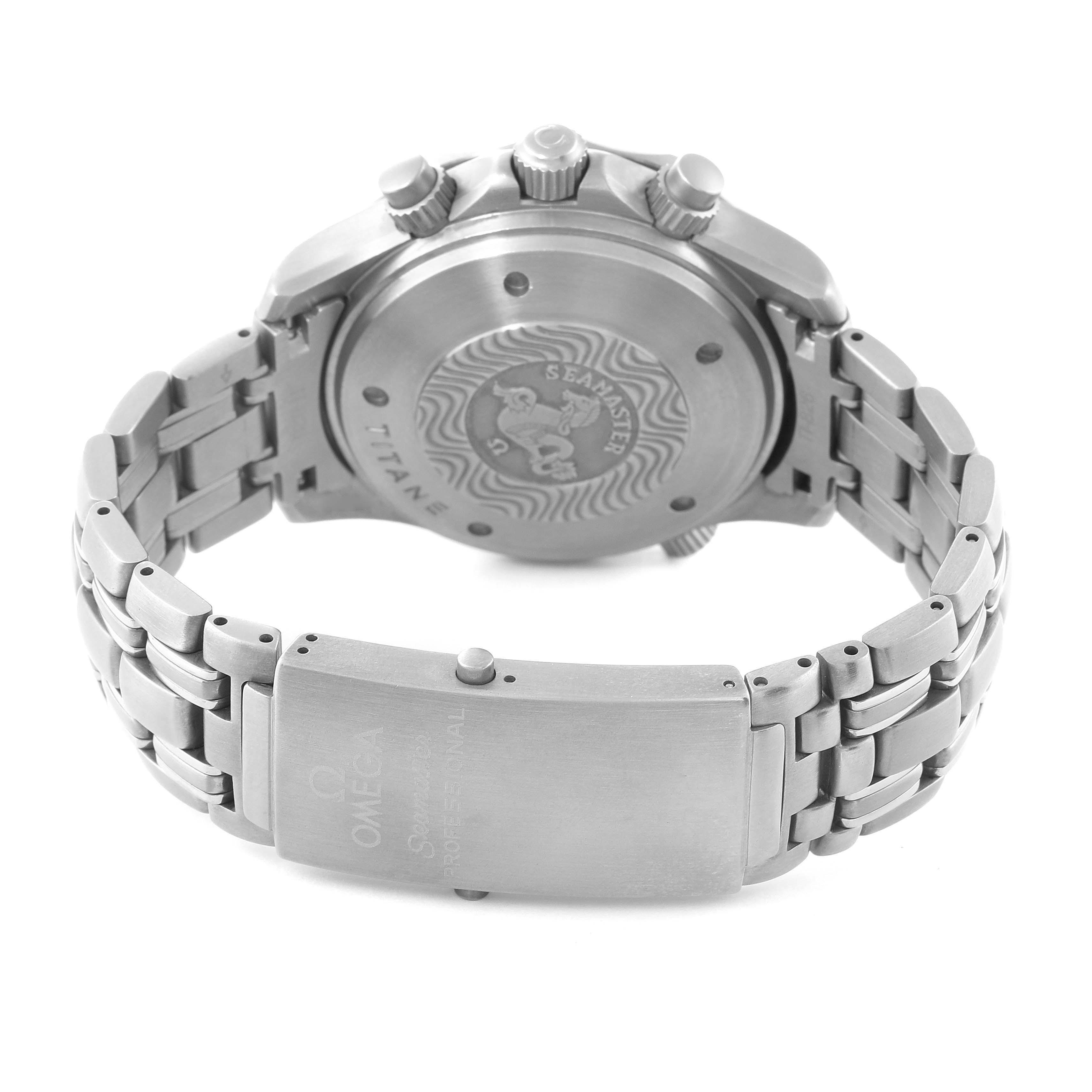 The image shows the back case and bracelet clasp of an Omega Seamaster 2298.80.00 Men's Stainless Steel Blue Dial 2298.80.00 Men's Stainless Steel Blue Dial watch, focusing on the detailed engravings.