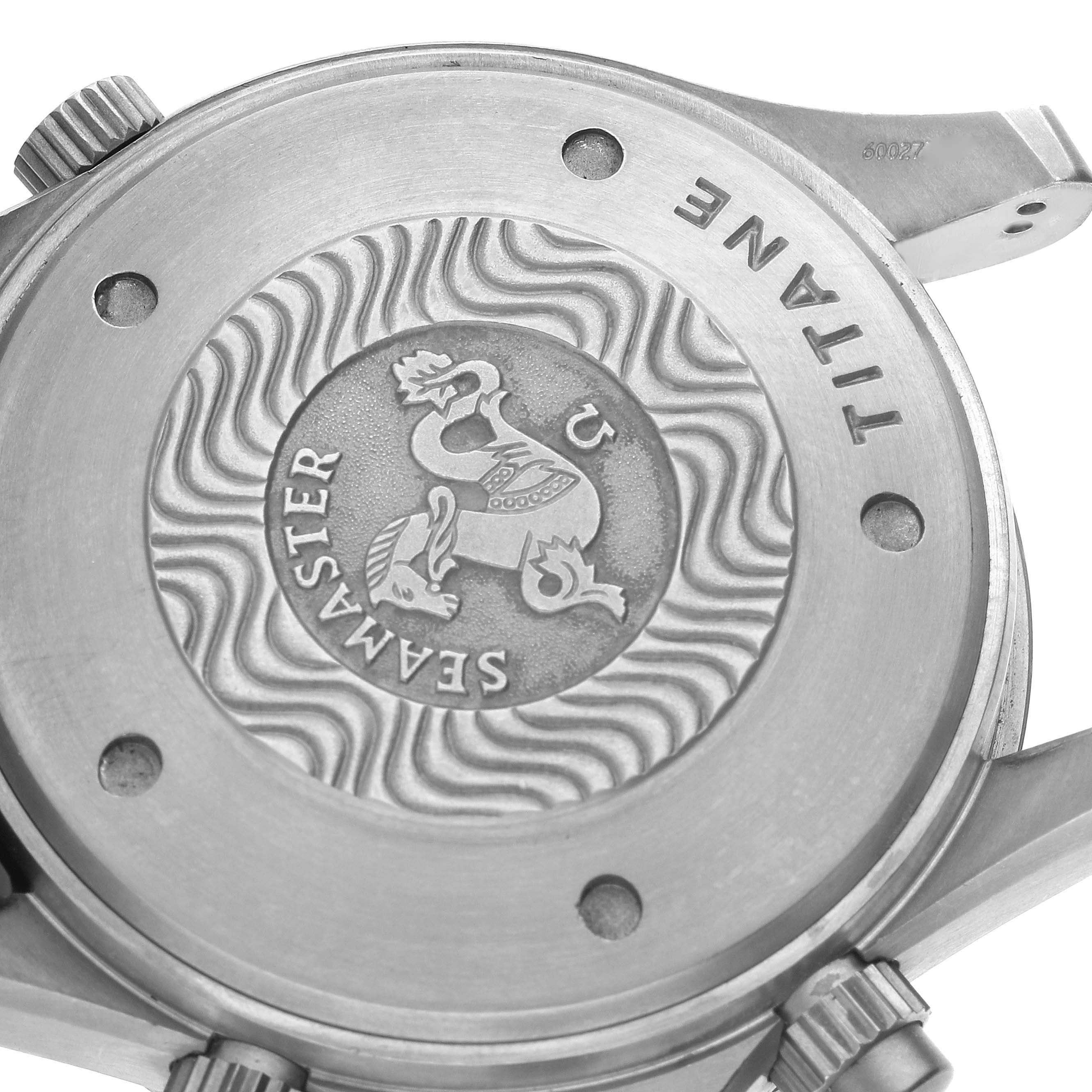 This image shows the case back of the Omega Seamaster 2298.80.00 Men's Stainless Steel Blue Dial 2298.80.00 Men's Stainless Steel Blue Dial watch, highlighting its engraved design and the word "Titanium."