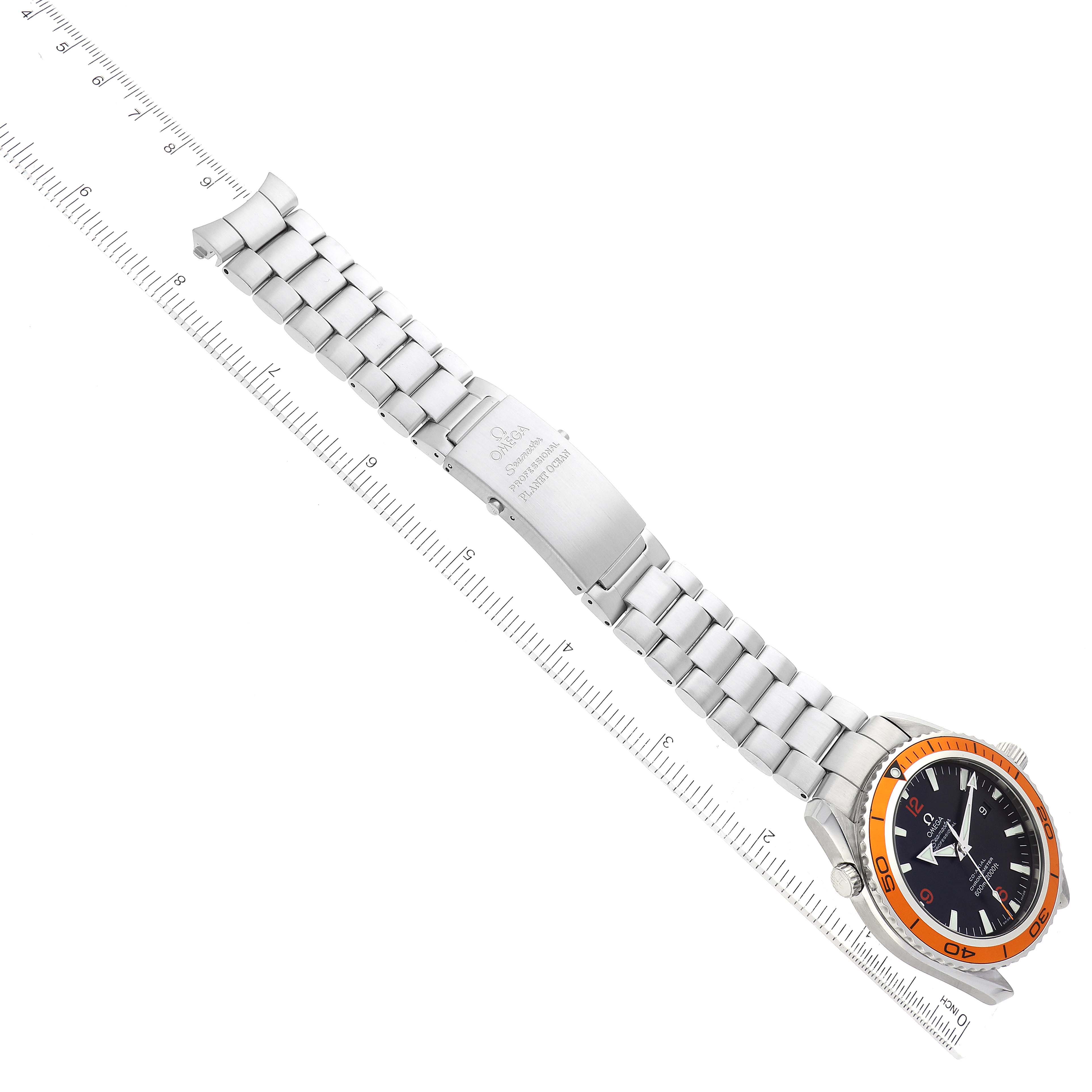 The image shows a top-down view of the Omega Planet Ocean 2208.50.00 Men's Stainless Steel Black Dial 2208.50.00 Men's Stainless Steel Black Dial watch, highlighting the dial, bezel, and stainless steel bracelet with clasp.