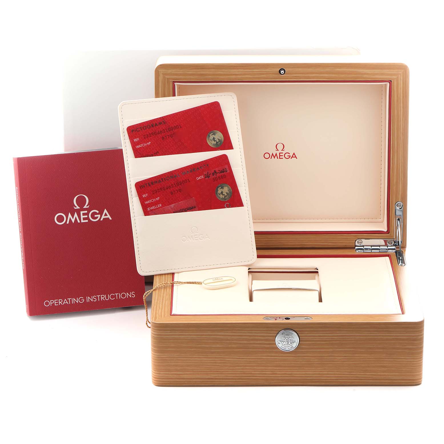 The image shows an Omega Planet Ocean 232.90.46.21.03.001 Men
s Titanium Blue Dial 232.90.46.21.03.001 Men
s Titanium Blue Dial watch box, warranty cards, and an operating instructions booklet.