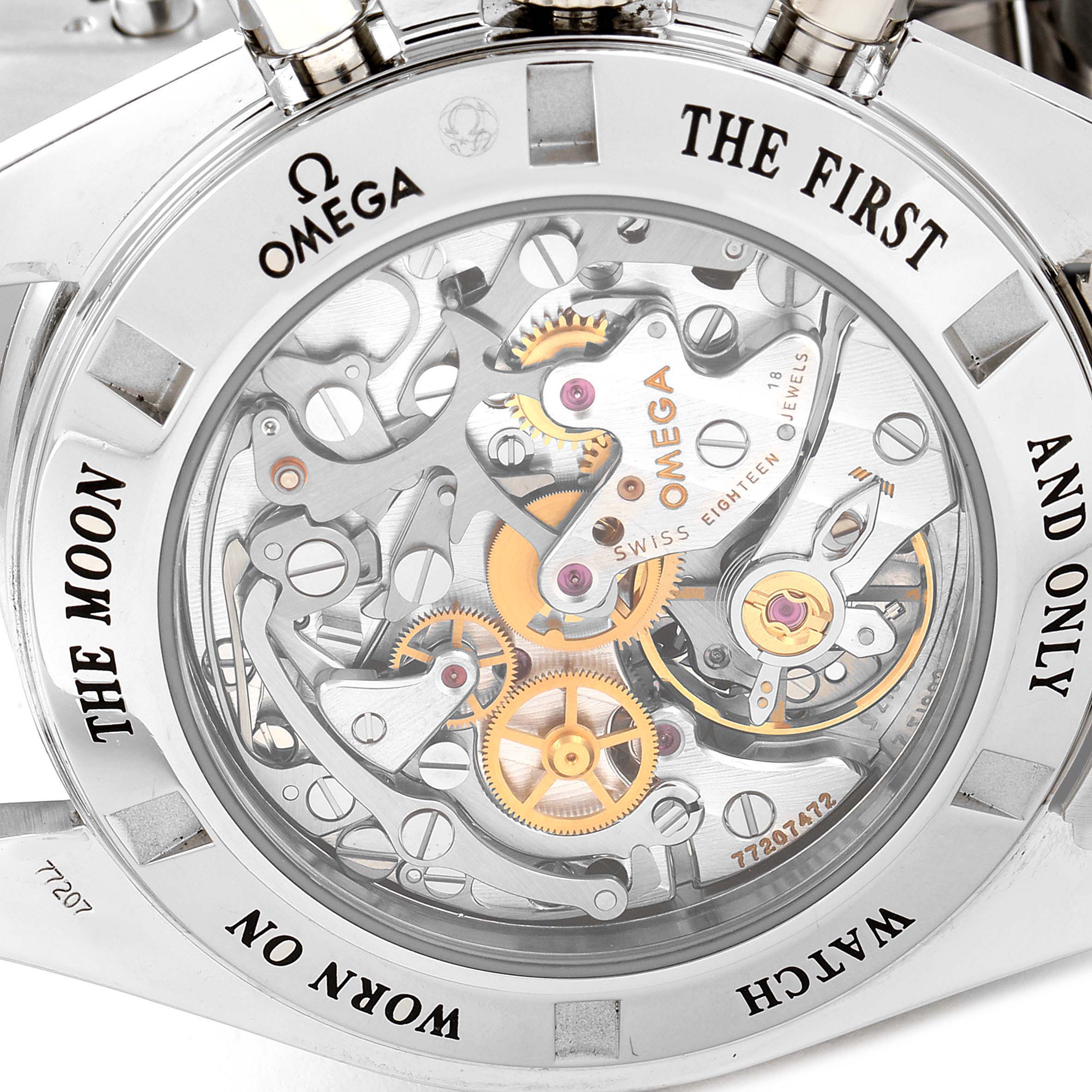 This image shows the transparent case back of an Omega Speedmaster 3573.50.00 Men
s Stainless Steel Black Dial 3573.50.00 Men
s Stainless Steel Black Dial, revealing the intricate movement mechanism inside.