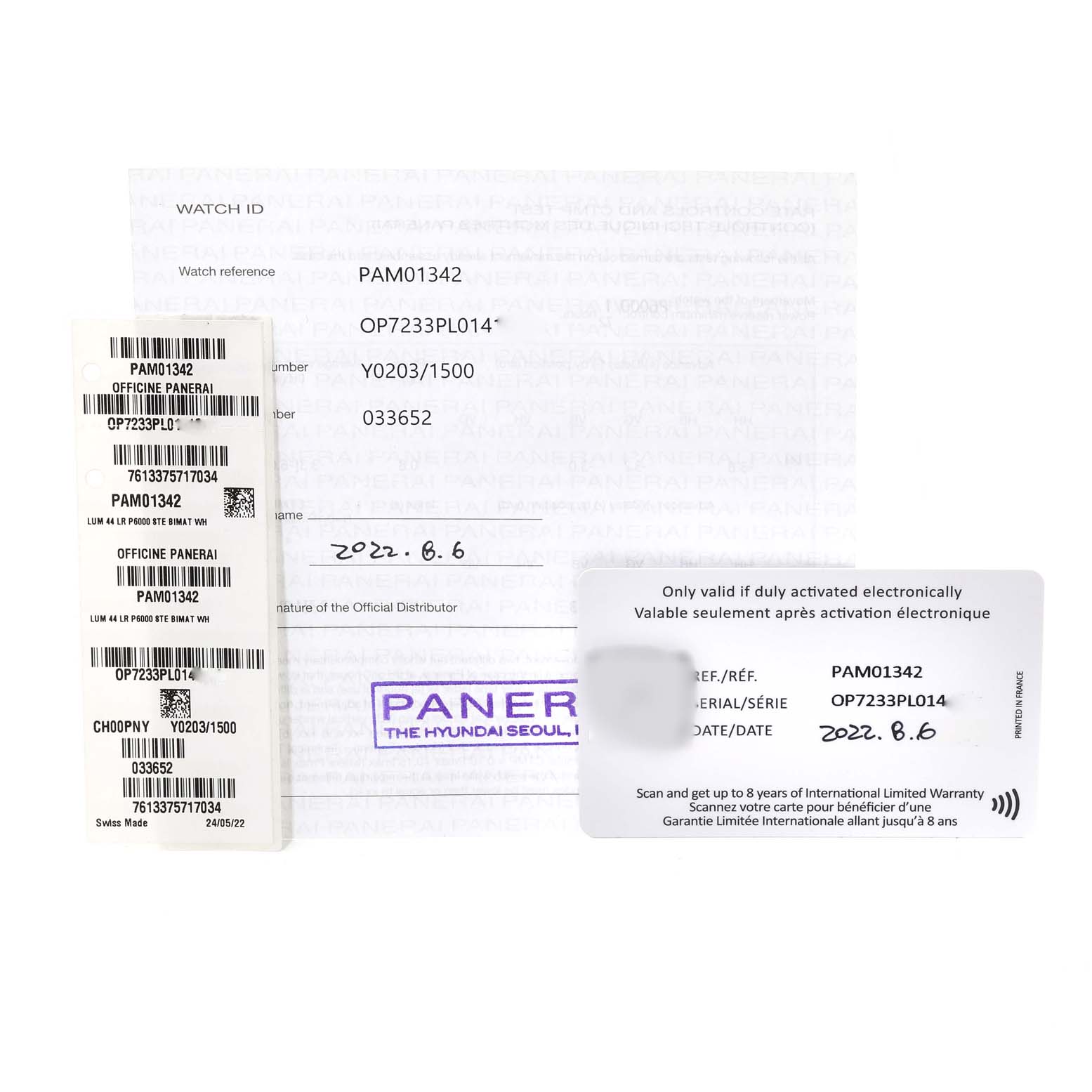 The accessories for the Luminor model by Panerai include warranty cards and identification stickers shown from the top view.