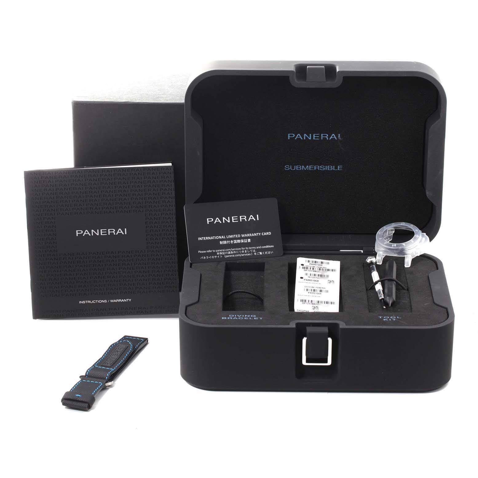 The image shows a Panerai Submersible PAM01068 Men's Stainless Steel Blue Dial PAM01068 Men's Stainless Steel Blue Dial watch set with accessories, including a strap, tools, and warranty cards, at a front angle.
