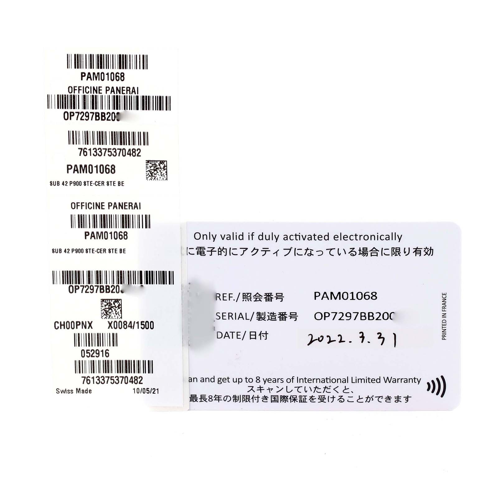 The image shows warranty cards and tags for a Panerai Submersible PAM01068 Men's Stainless Steel Blue Dial PAM01068 Men's Stainless Steel Blue Dial model PAM01068 with serial number OP7297BB20.