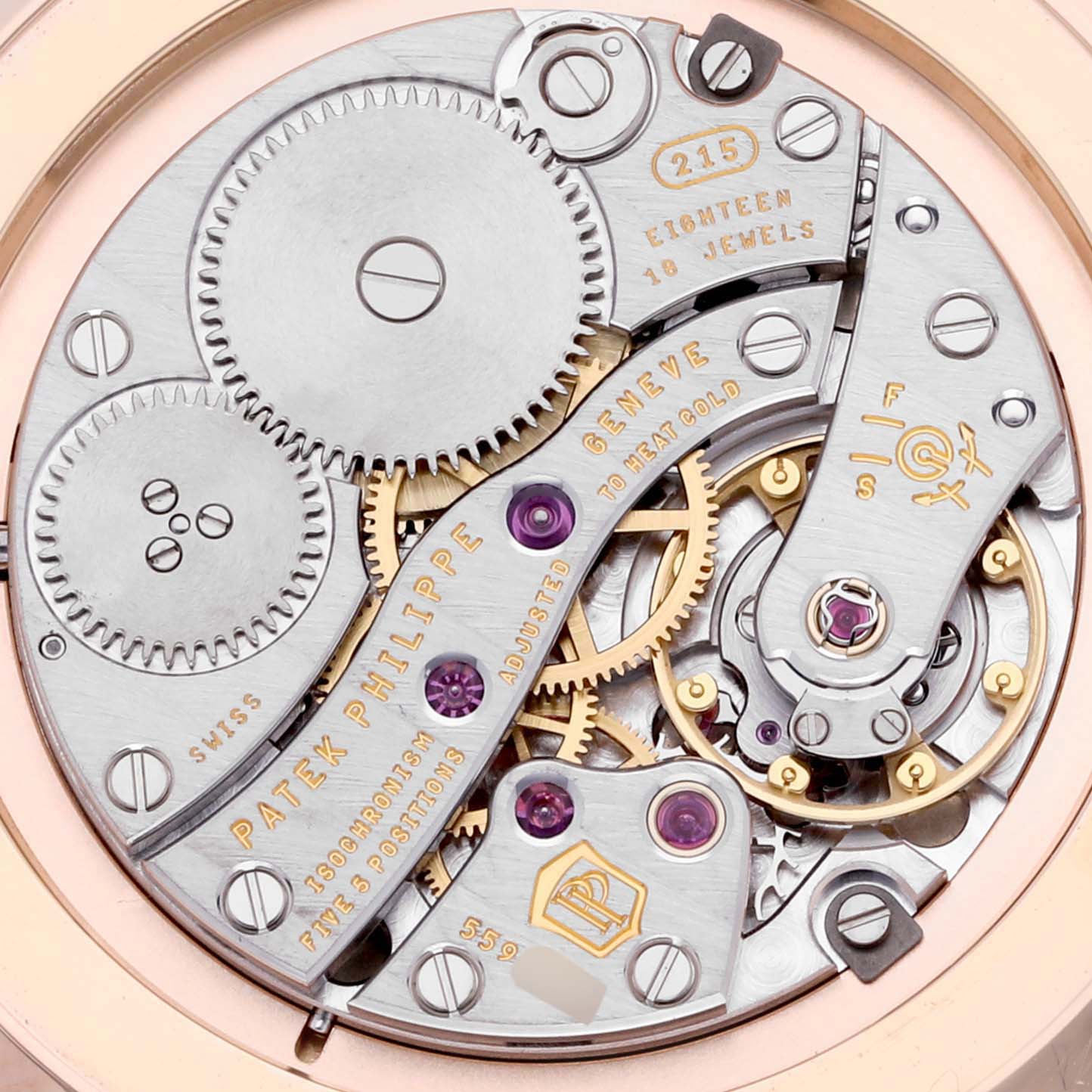 The image shows the movement of the Patek Philippe Calatrava 5119R-001 Men
s Rose Gold White Dial 5119R-001 Men
s Rose Gold White Dial, highlighting the gears, jewels, and engravings from a back view.