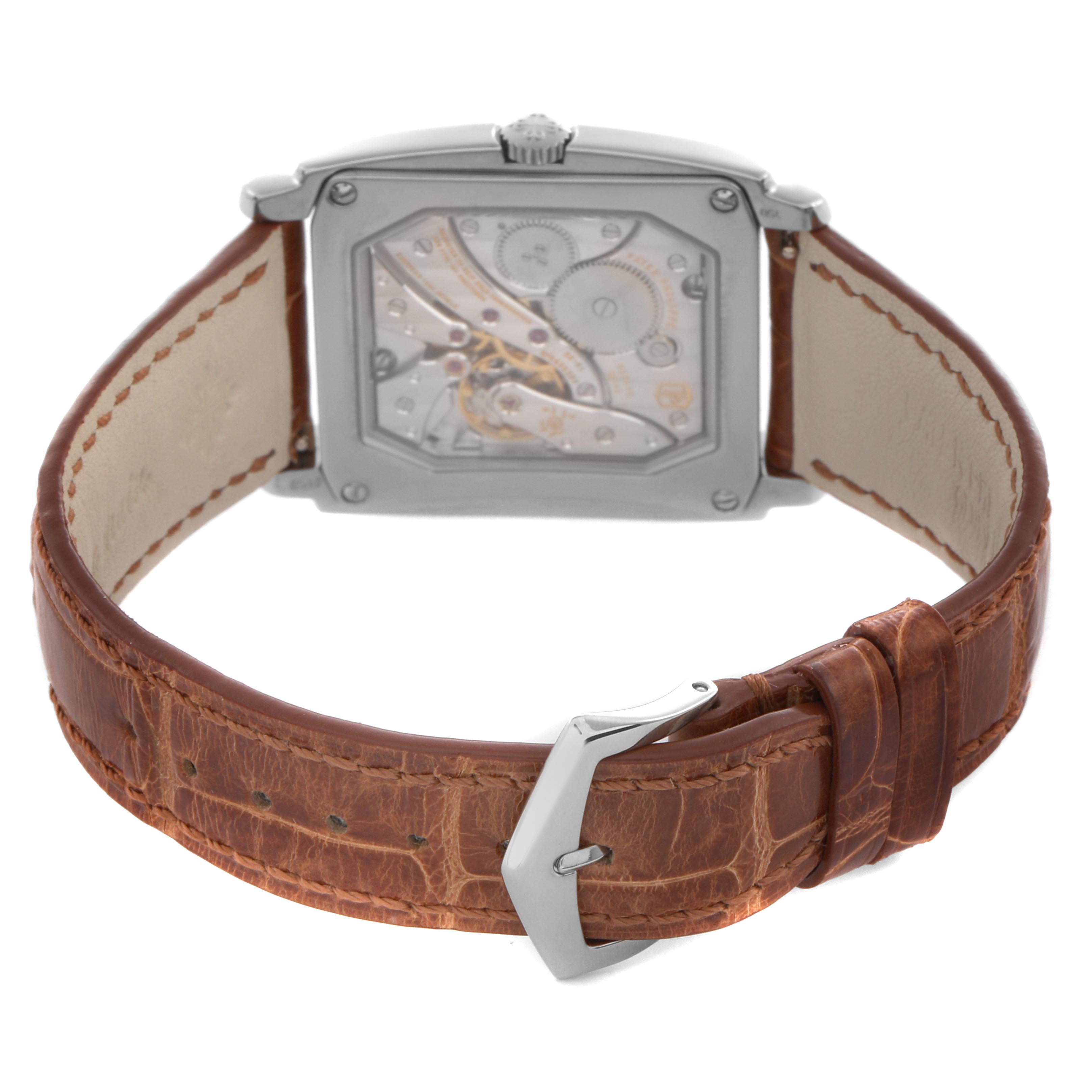 The image shows the back of a Patek Philippe Gondolo 5124G-001 Men
s White Gold Brown Dial 5124G-001 Men
s White Gold Brown Dial watch, highlighting the movement through the transparent case back and the leather strap with buckle.