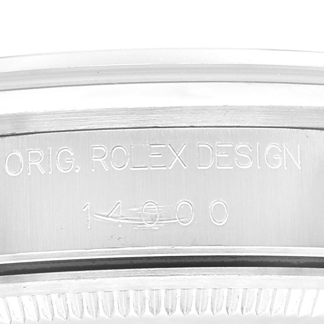 This is a close-up of the side of a Rolex Air-King 14000 Men's Stainless Steel Black Dial 14000 Men's Stainless Steel Black Dial watch, showing the engraved bezel edge and model number "14000."
