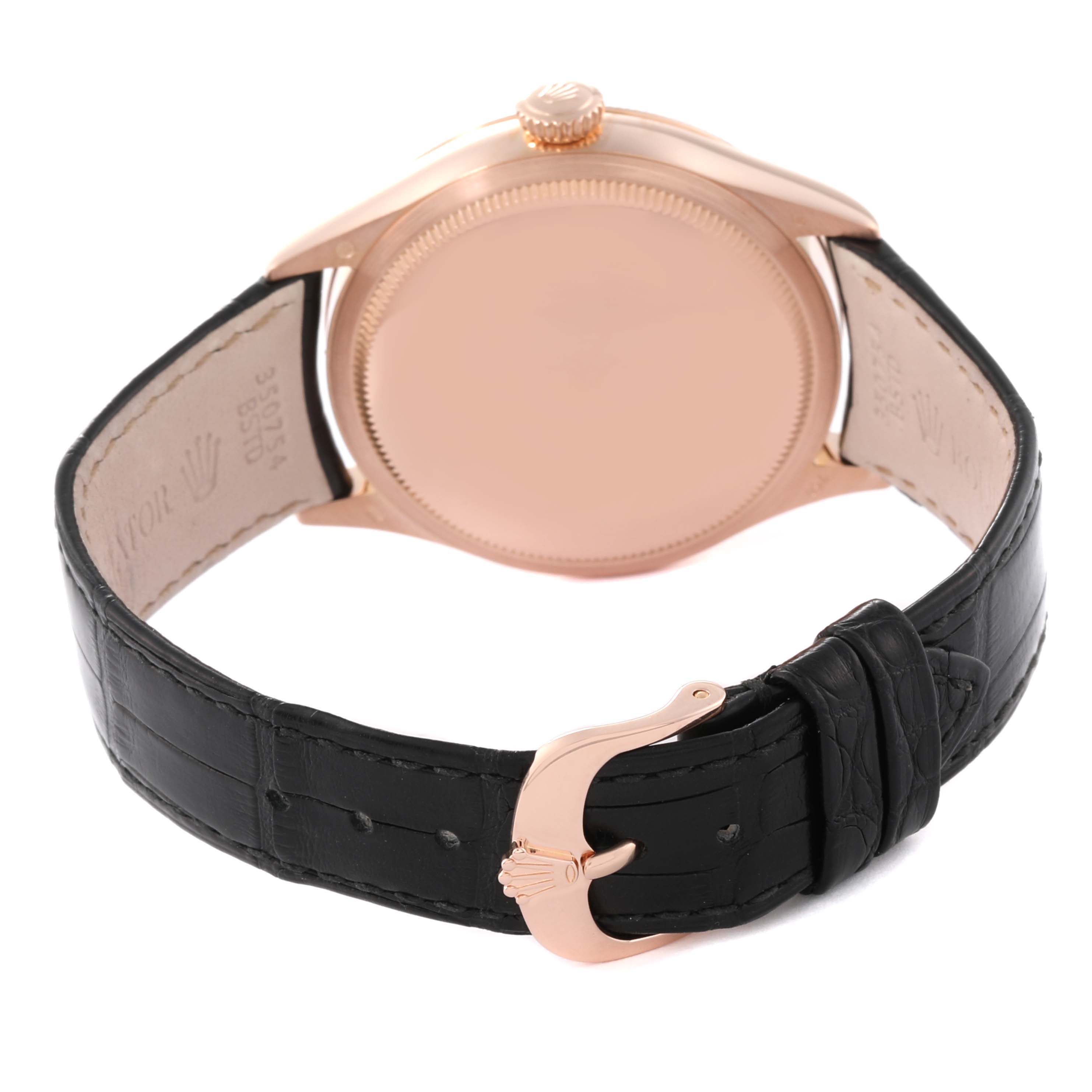 The image shows the back of a Rolex Cellini 50505 Men's Rose Gold White Dial 50505 Men's Rose Gold White Dial watch and its black leather strap with a rose gold buckle.