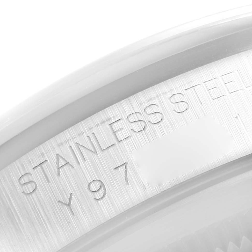 The image shows a close-up of the stainless steel case back engraving on a Rolex Datejust 16200 Men's Stainless Steel Grey Dial 16200 Men's Stainless Steel Grey Dial watch.