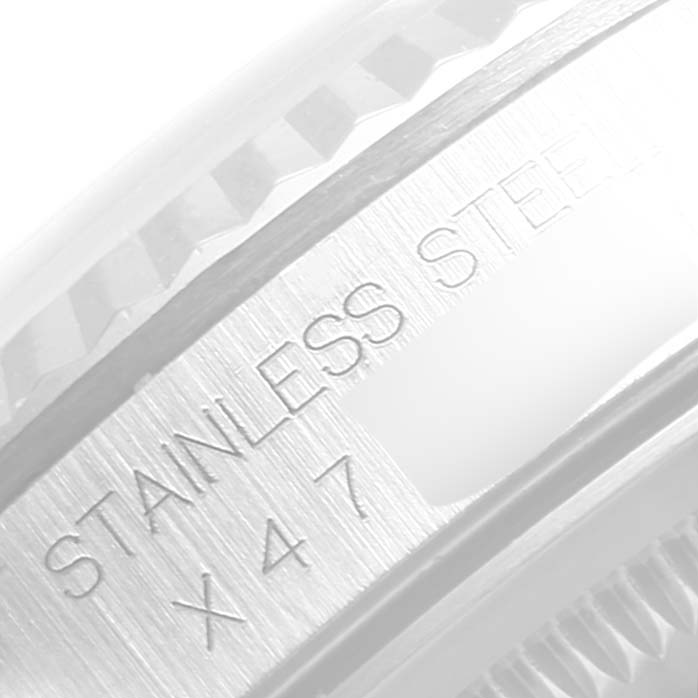 The image shows a close-up side angle of the stainless steel case of a Rolex Datejust 16234 Men
s Stainless Steel Pink Dial 16234 Men
s Stainless Steel Pink Dial watch.