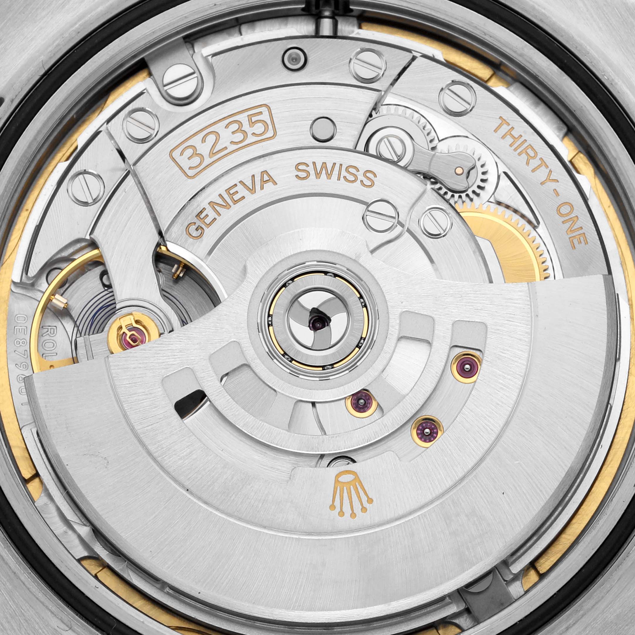 The image shows a close-up of the Rolex Datejust 41 126334NG Men
s Stainless Steel Mother of Pearl Dial 126334NG Men
s Stainless Steel Mother of Pearl Dial movement, specifically the 3235 caliber.