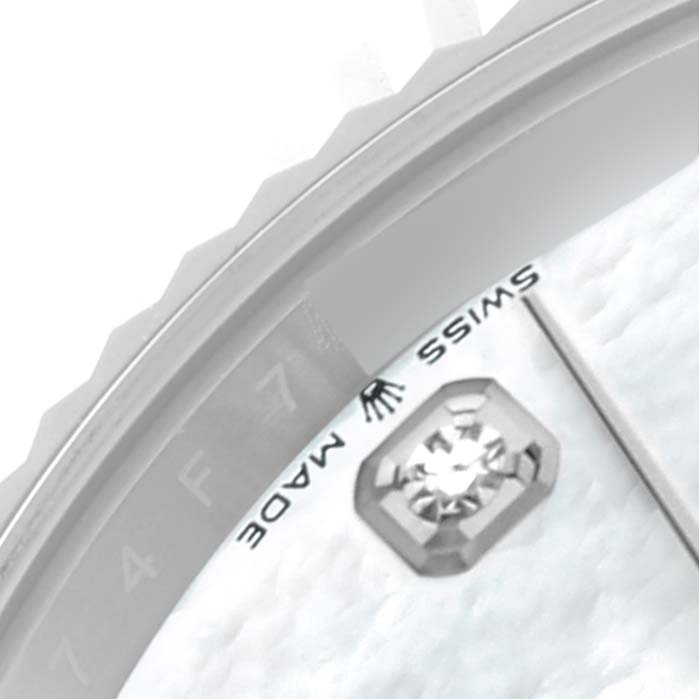 The image shows a close-up of the dial and bezel of the Rolex Datejust 41 126334NG Men
s Stainless Steel Mother of Pearl Dial 126334NG Men
s Stainless Steel Mother of Pearl Dial, including a diamond marker and "Swiss Made" text.