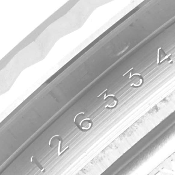 This image shows a close-up of the bezel and part of the dial of a Rolex Datejust 41 126334 Men
s Stainless Steel Grey Dial 126334 Men
s Stainless Steel Grey Dial watch, highlighting the engraved numbers.