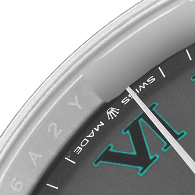This close-up shows the dial of the Rolex Datejust 41 126334 Men
s Stainless Steel Grey Dial 126334 Men
s Stainless Steel Grey Dial, highlighting the "Swiss Made" text, Rolex logo, and part of the hour mark.