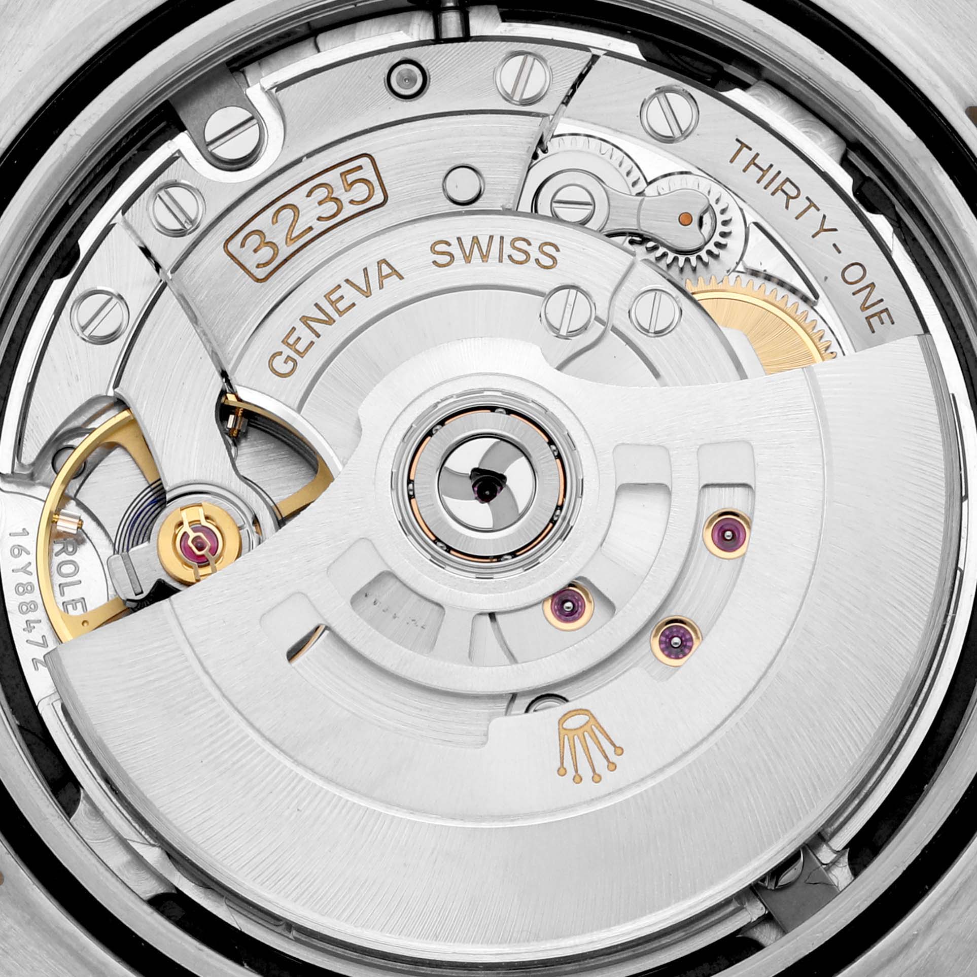 This image shows a close-up view of the movement mechanism of a Rolex Datejust 41 M126333-0012 Men's Steel and Gold (two tone) Black Dial M126333-0012 Men's Steel and Gold (two tone) Black Dial watch.