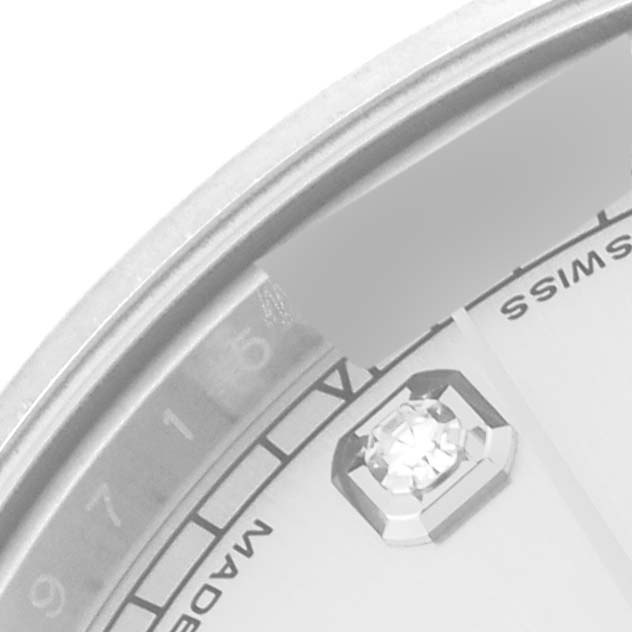This image shows a close-up angle of the Rolex Datejust 41 116334 Men
s Stainless Steel Silver Dial 116334 Men
s Stainless Steel Silver Dial watch, focusing on the bezel, dial edge, and a jeweled hour marker.