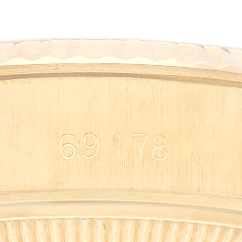 The image shows the side of a Rolex President 69178 Women's Yellow Gold Champagne Dial 69178 Women's Yellow Gold Champagne Dial model, highlighting the model number "69178" engraved on the case.